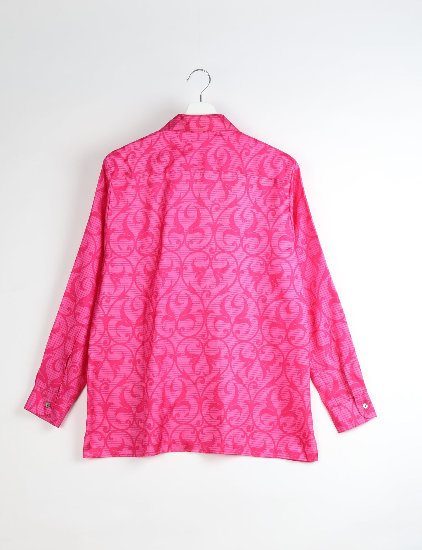 A person wearing a Resort Shirt, a sustainable fashion choice made from recycled materials.