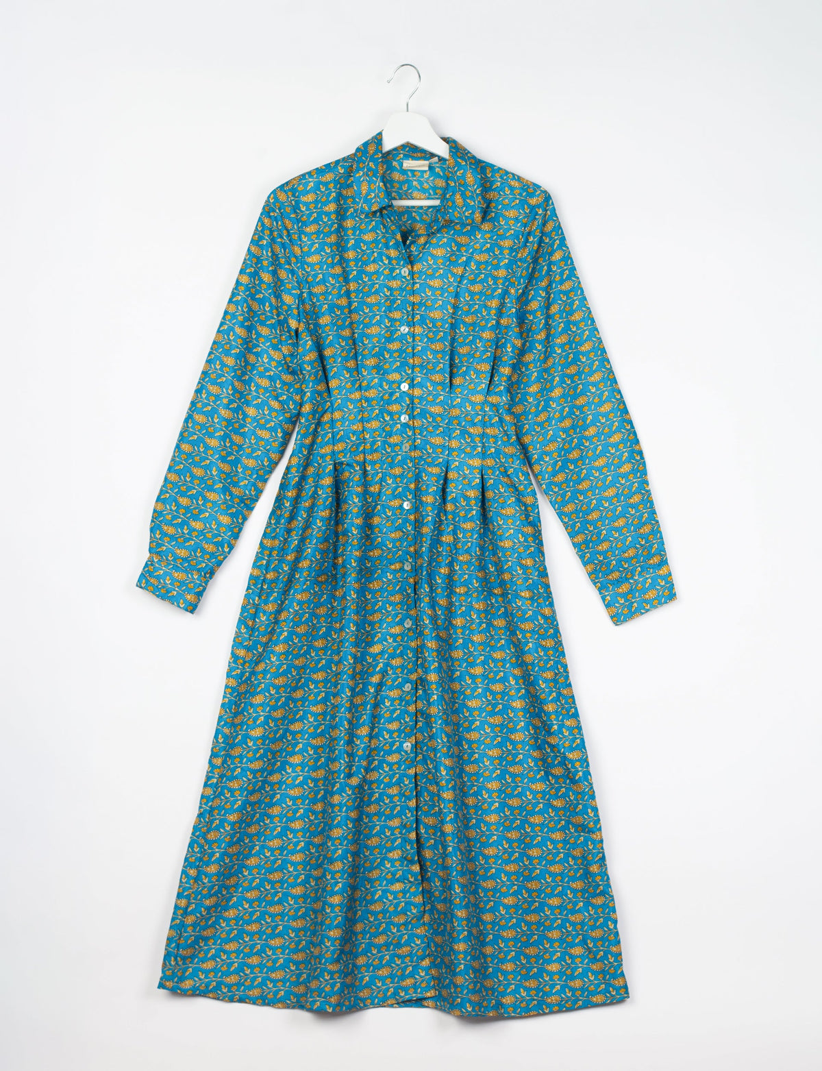 Midi shirt dress with cinched waist, crafted from recycled fabric. A sustainable women's clothing piece representing ethical fashion, eco-friendly products, and upcycled women's clothing.