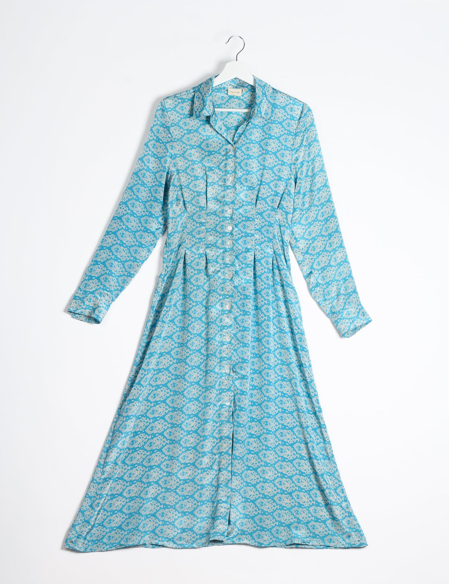 Midi shirt dress with cinched waist, crafted from recycled fabric. A sustainable women's clothing piece representing ethical fashion, eco-friendly products, and upcycled women's clothing.