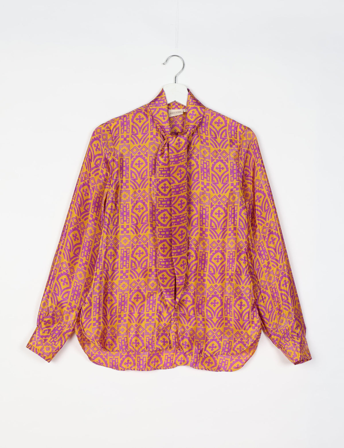 Roll-over collar Bowtie Shirt, eco-friendly and upcycled women's clothing made from recycled materials. Sustainable apparel reflecting green fashion, zero waste clothing, and conscious fashion choices.