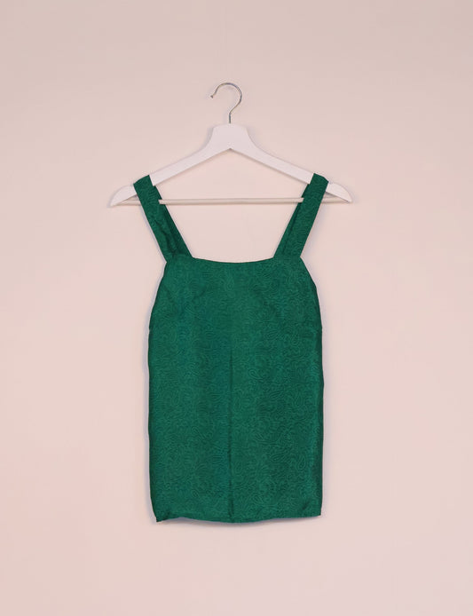 Sustainable strap top with square neckline and adjustable straps. Made from eco-friendly materials for a stylish and conscious wardrobe choice.