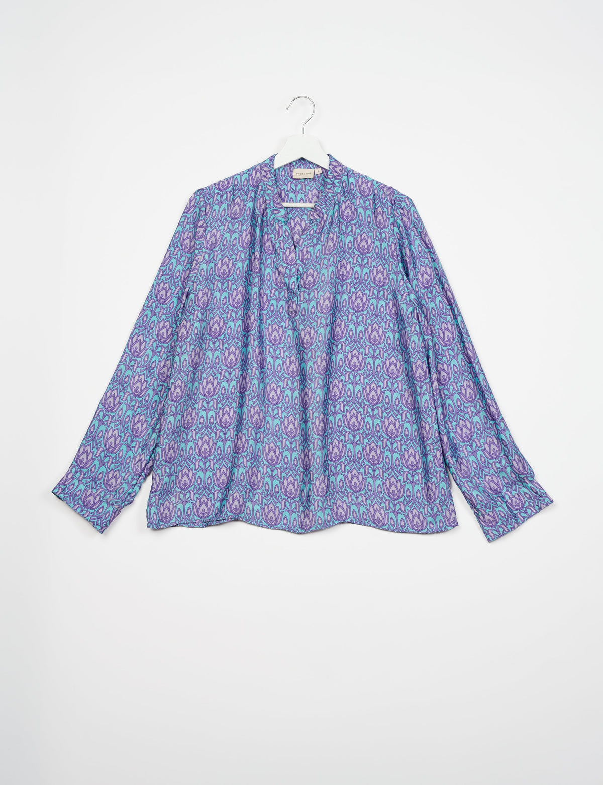 Versatile DAY BLOUSE, a sustainable wardrobe essential with a classic Johnny collar and full sleeves. Lightweight fabric for a comfortable fit, perfect for dressing up or down. Explore ethical clothing and green fashion with this eco-friendly and timeless piece, perfect for any occasion.