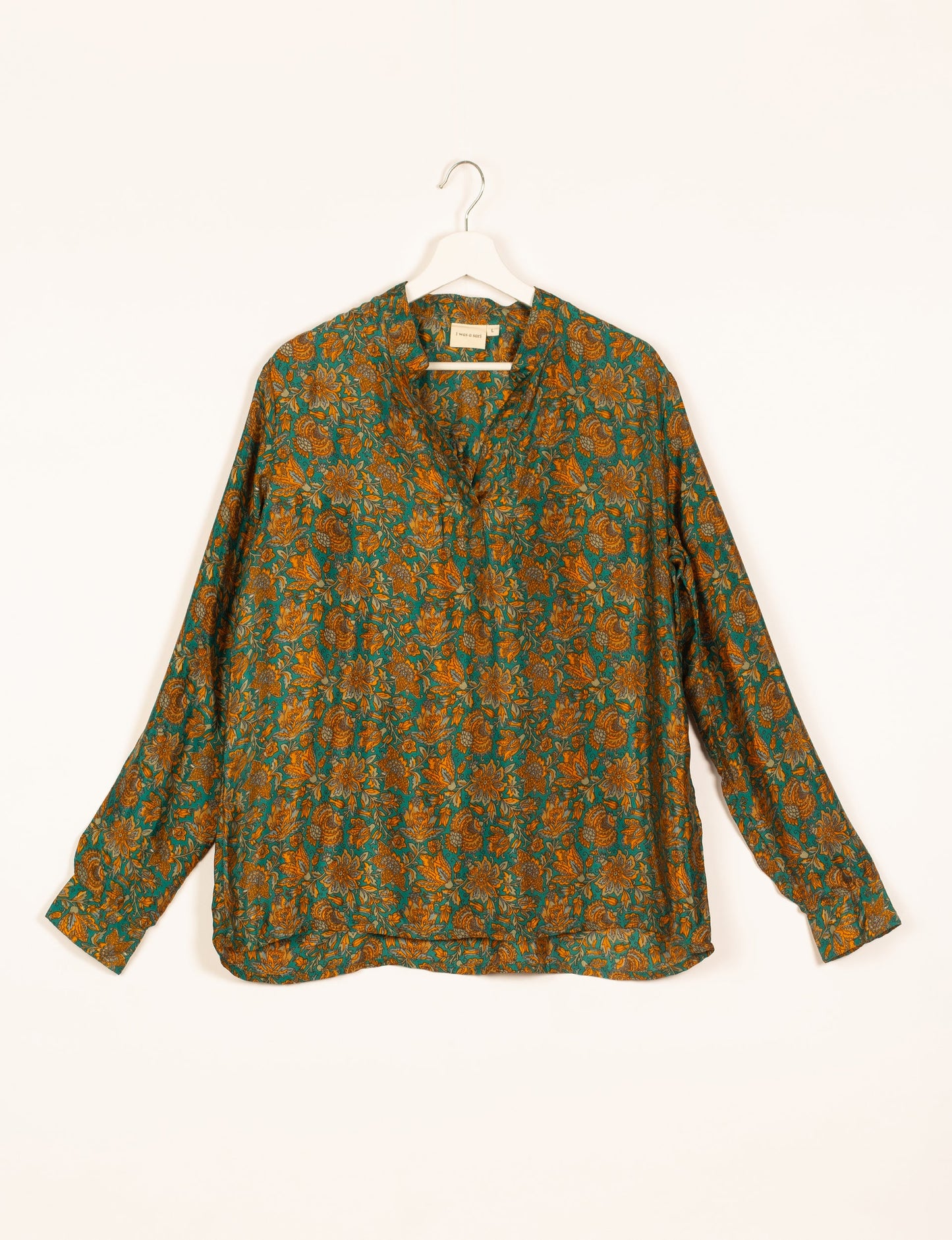 Versatile DAY BLOUSE, a sustainable wardrobe essential with a classic Johnny collar and full sleeves. Lightweight fabric for a comfortable fit, perfect for dressing up or down. Explore ethical clothing and green fashion with this eco-friendly and timeless piece, perfect for any occasion.