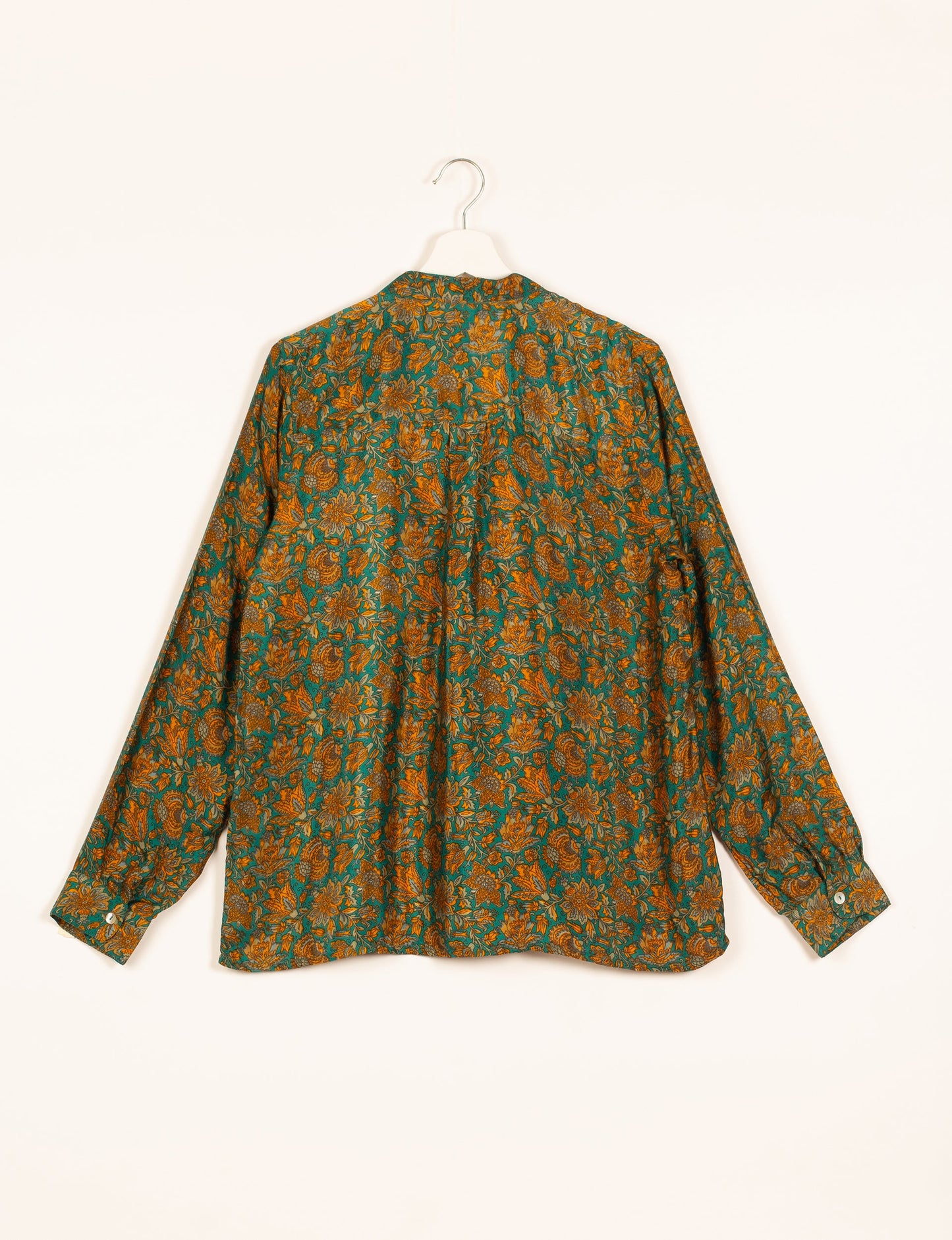 Versatile DAY BLOUSE, a sustainable wardrobe essential with a classic Johnny collar and full sleeves. Lightweight fabric for a comfortable fit, perfect for dressing up or down. Explore ethical clothing and green fashion with this eco-friendly and timeless piece, perfect for any occasion.