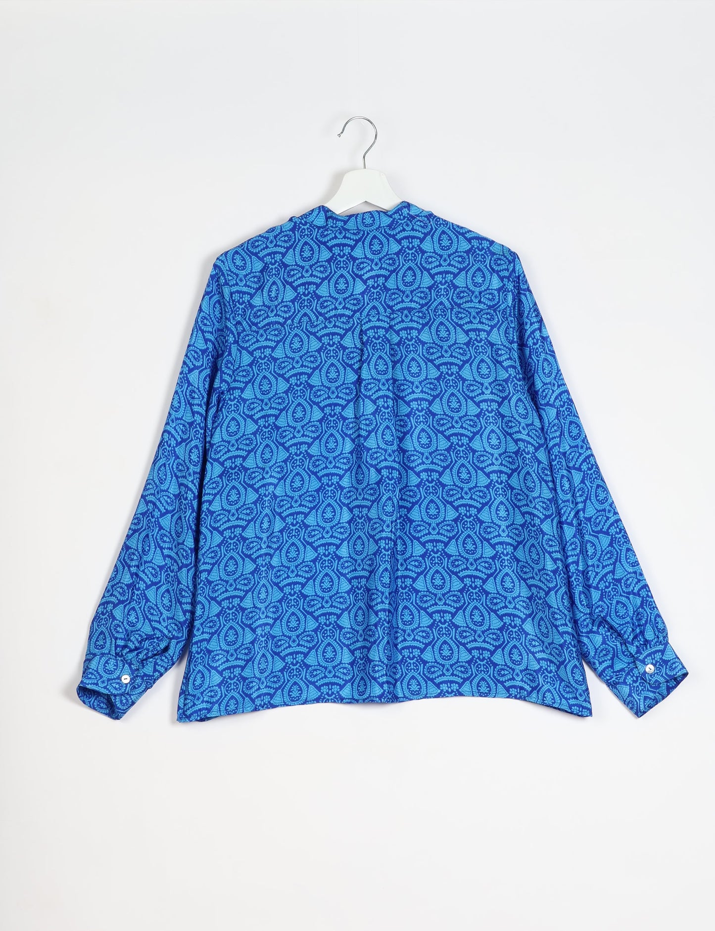 Versatile DAY BLOUSE, a sustainable wardrobe essential with a classic Johnny collar and full sleeves. Lightweight fabric for a comfortable fit, perfect for dressing up or down. Explore ethical clothing and green fashion with this eco-friendly and timeless piece, perfect for any occasion.