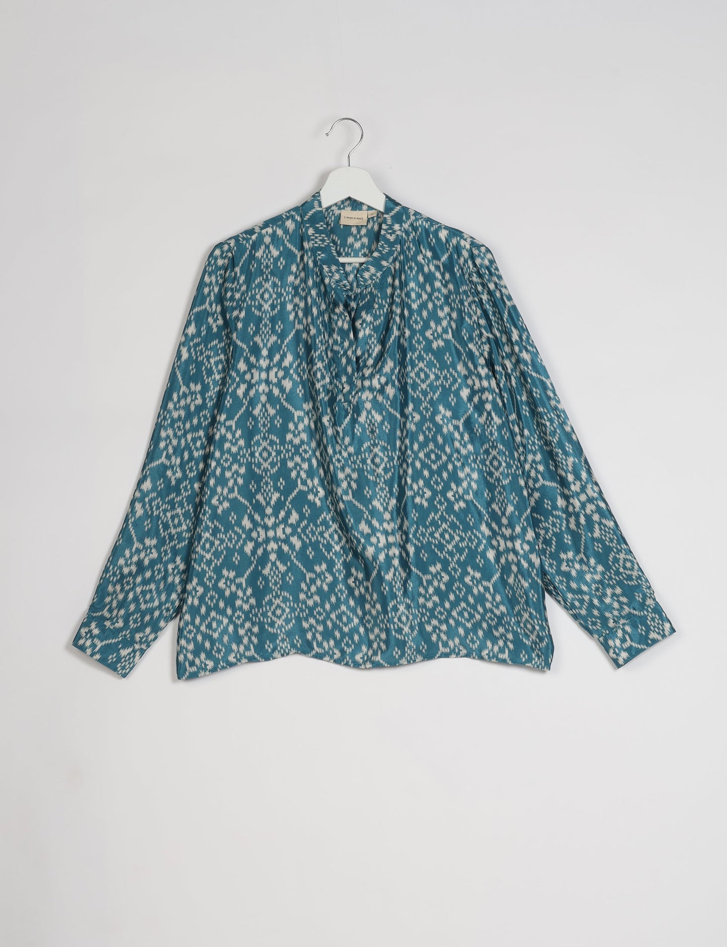 Versatile DAY BLOUSE, a sustainable wardrobe essential with a classic Johnny collar and full sleeves. Lightweight fabric for a comfortable fit, perfect for dressing up or down. Explore ethical clothing and green fashion with this eco-friendly and timeless piece, perfect for any occasion.