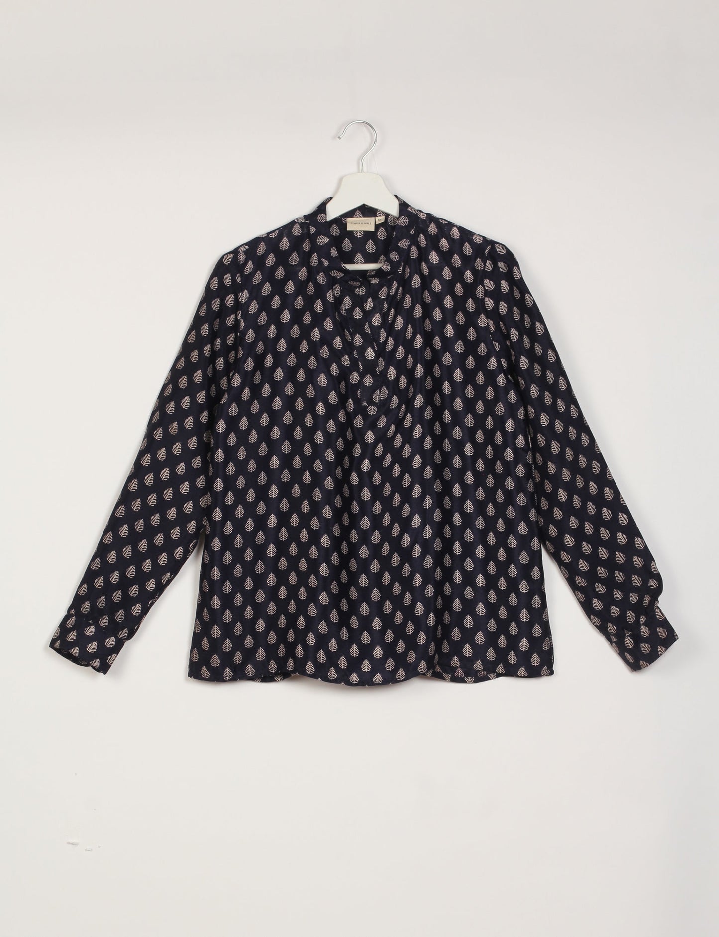 Versatile DAY BLOUSE, a sustainable wardrobe essential with a classic Johnny collar and full sleeves. Lightweight fabric for a comfortable fit, perfect for dressing up or down. Explore ethical clothing and green fashion with this eco-friendly and timeless piece, perfect for any occasion.