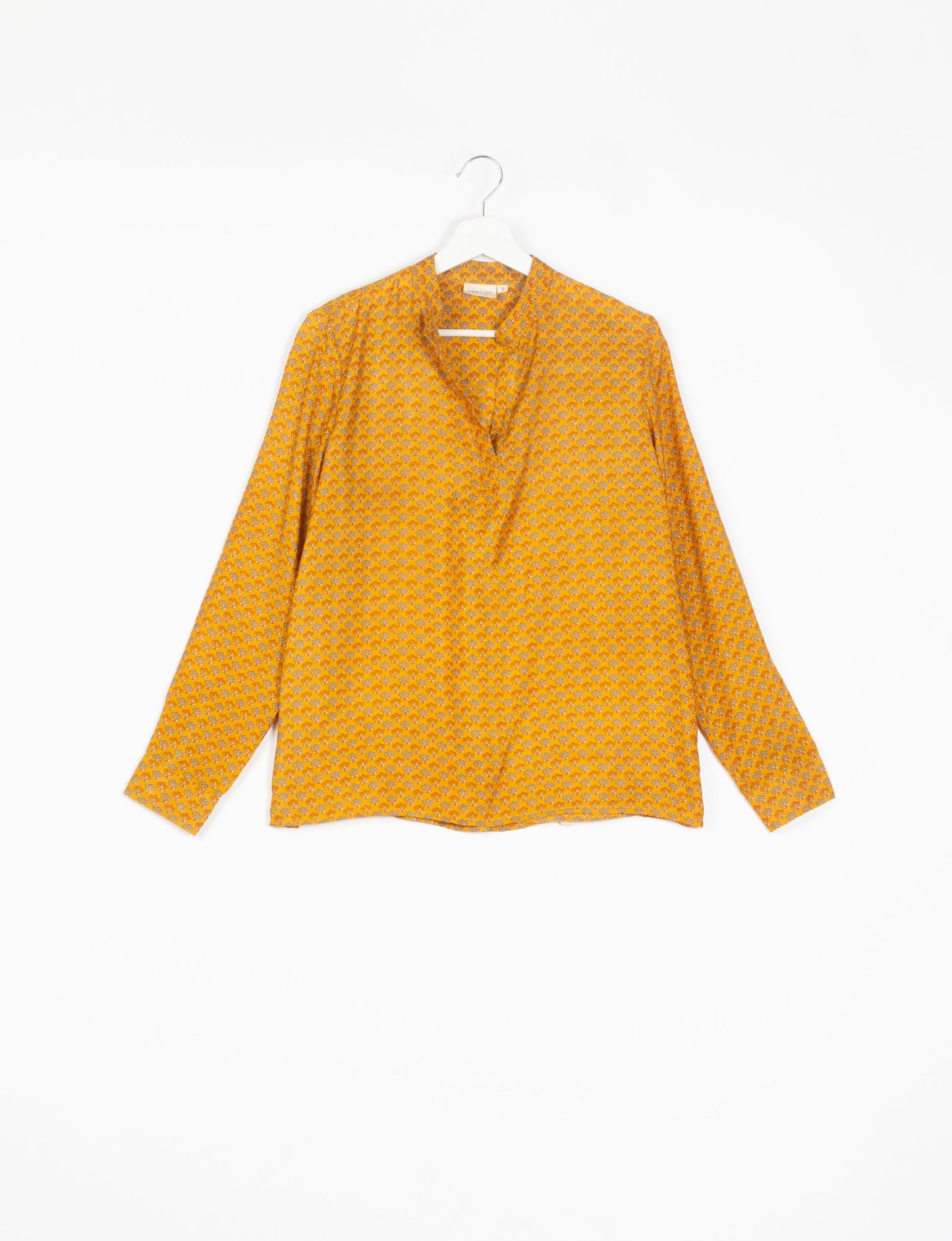 Versatile DAY BLOUSE, a sustainable wardrobe essential with a classic Johnny collar and full sleeves. Lightweight fabric for a comfortable fit, perfect for dressing up or down. Explore ethical clothing and green fashion with this eco-friendly and timeless piece, perfect for any occasion.