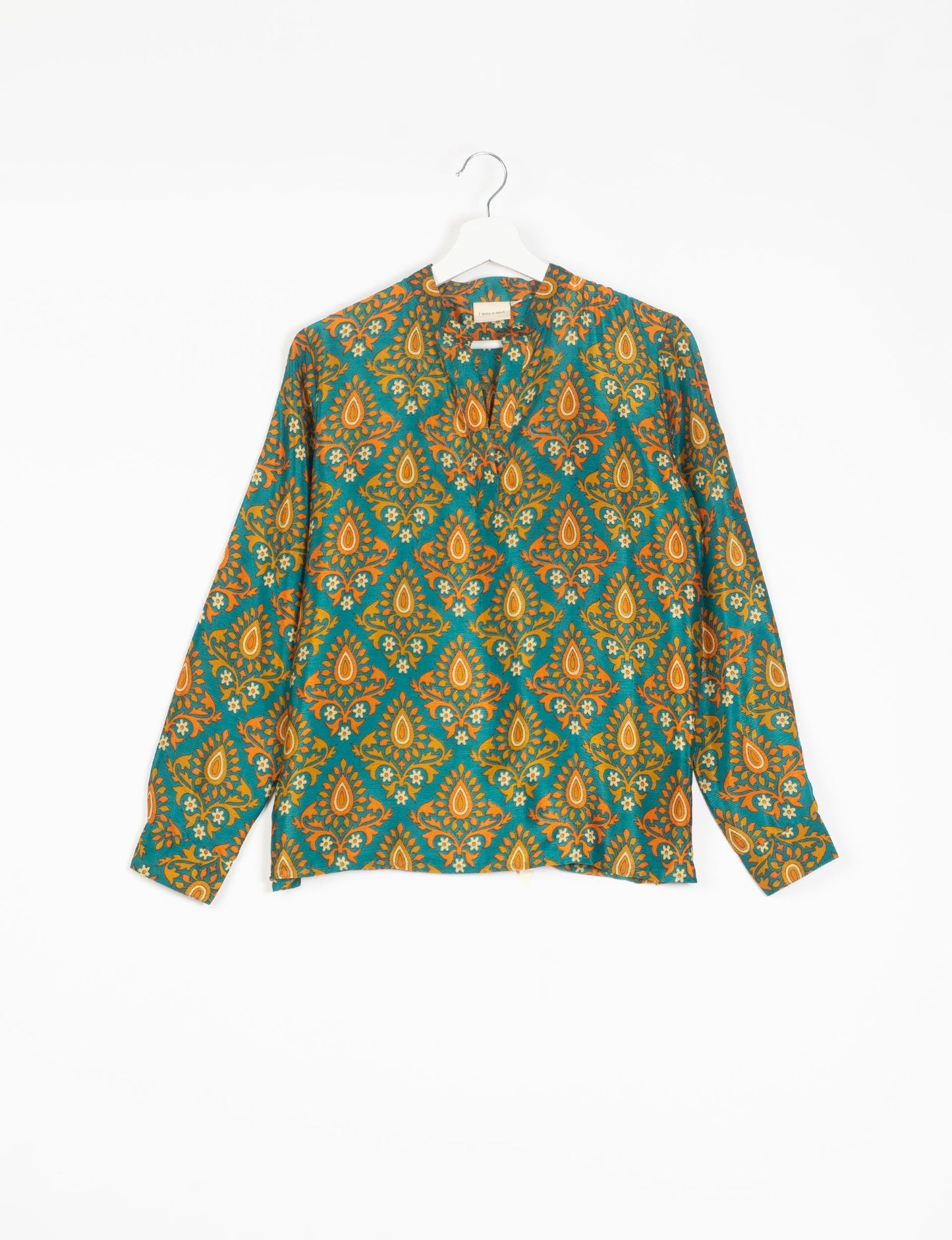 Versatile DAY BLOUSE, a sustainable wardrobe essential with a classic Johnny collar and full sleeves. Lightweight fabric for a comfortable fit, perfect for dressing up or down. Explore ethical clothing and green fashion with this eco-friendly and timeless piece, perfect for any occasion.