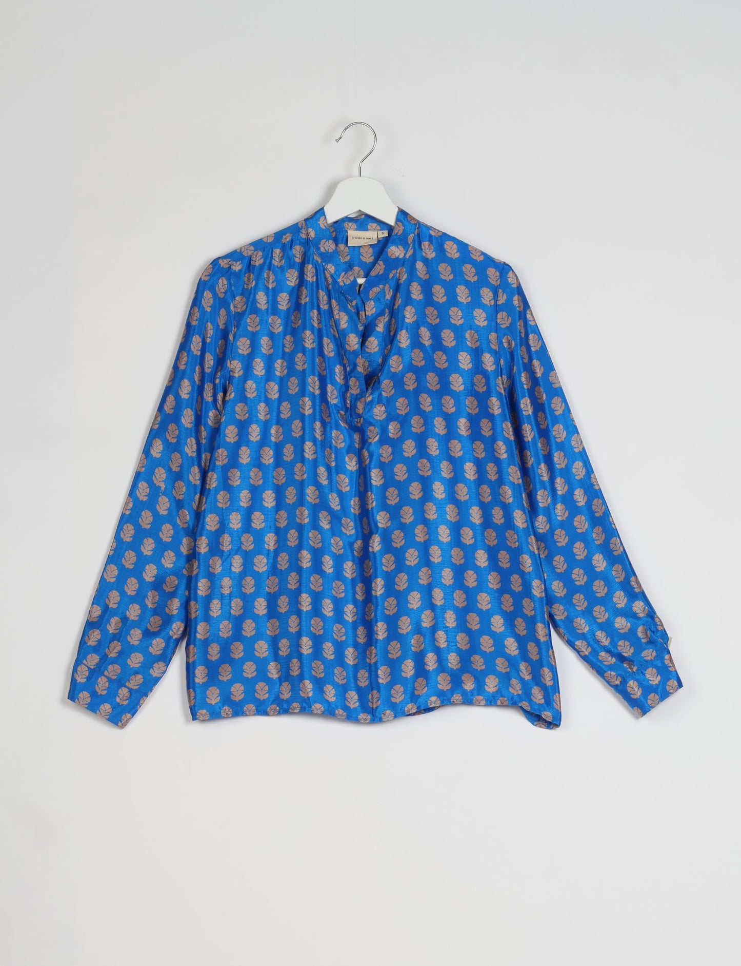 Versatile DAY BLOUSE, a sustainable wardrobe essential with a classic Johnny collar and full sleeves. Lightweight fabric for a comfortable fit, perfect for dressing up or down. Explore ethical clothing and green fashion with this eco-friendly and timeless piece, perfect for any occasion.