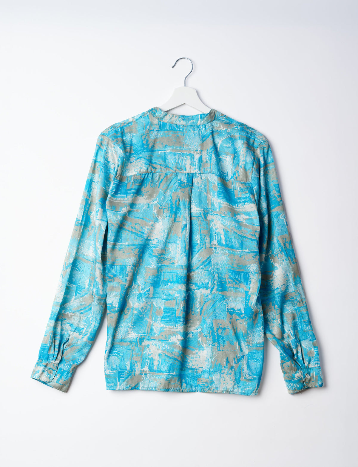 Versatile DAY BLOUSE, a sustainable wardrobe essential with a classic Johnny collar and full sleeves. Lightweight fabric for a comfortable fit, perfect for dressing up or down. Explore ethical clothing and green fashion with this eco-friendly and timeless piece, perfect for any occasion.