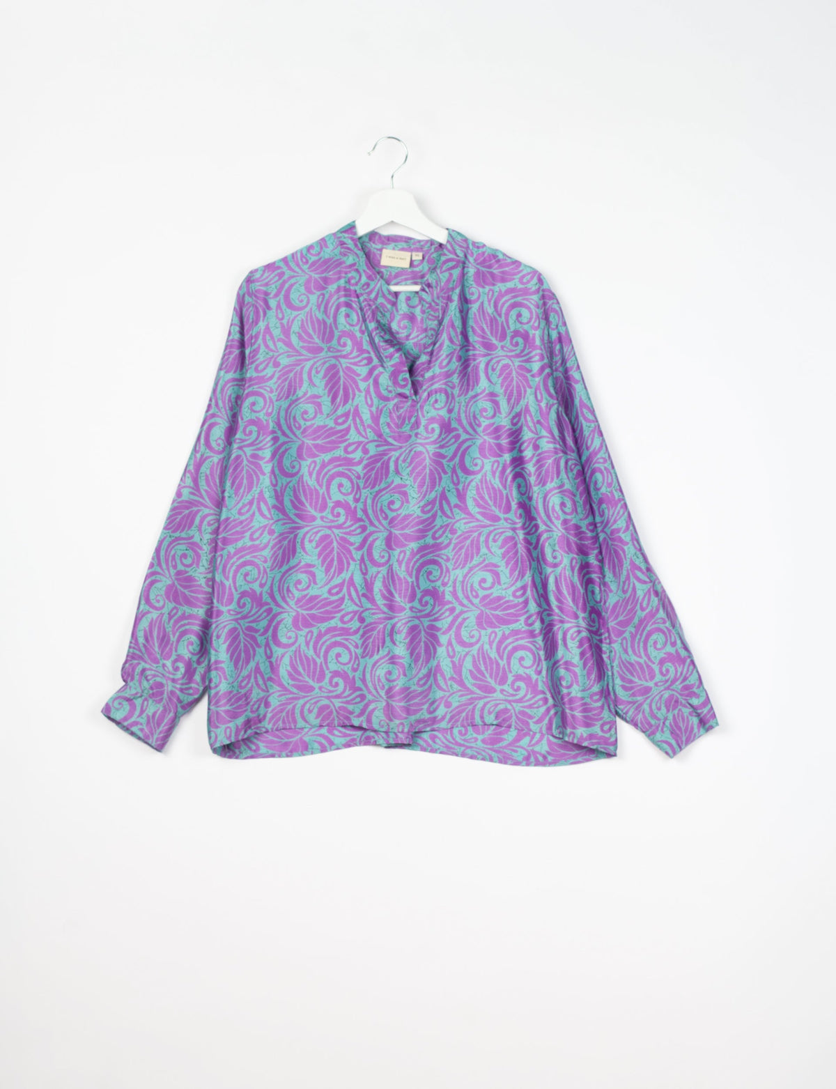 Versatile DAY BLOUSE, a sustainable wardrobe essential with a classic Johnny collar and full sleeves. Lightweight fabric for a comfortable fit, perfect for dressing up or down. Explore ethical clothing and green fashion with this eco-friendly and timeless piece, perfect for any occasion.