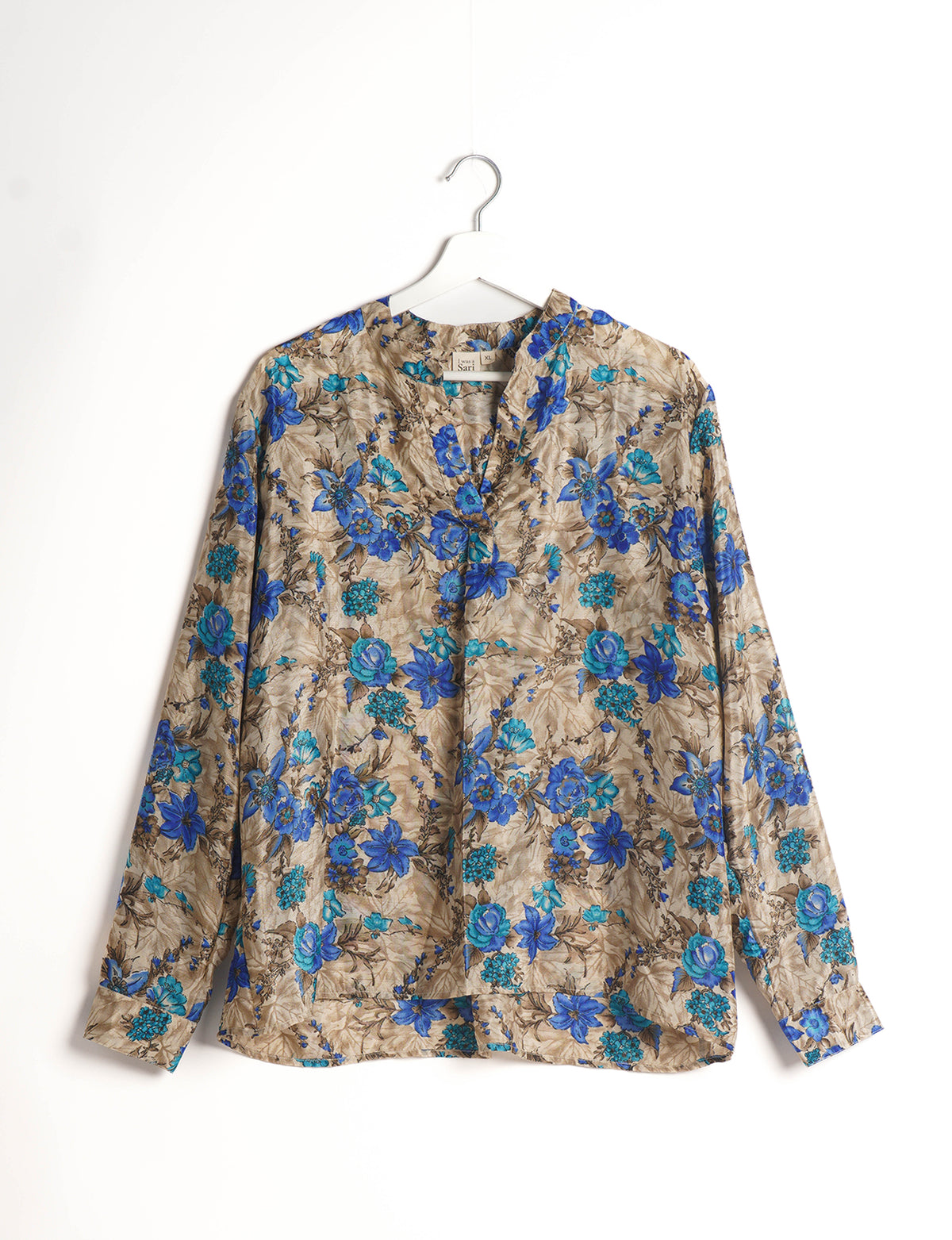 Versatile DAY BLOUSE, a sustainable wardrobe essential with a classic Johnny collar and full sleeves. Lightweight fabric for a comfortable fit, perfect for dressing up or down. Explore ethical clothing and green fashion with this eco-friendly and timeless piece, perfect for any occasion.