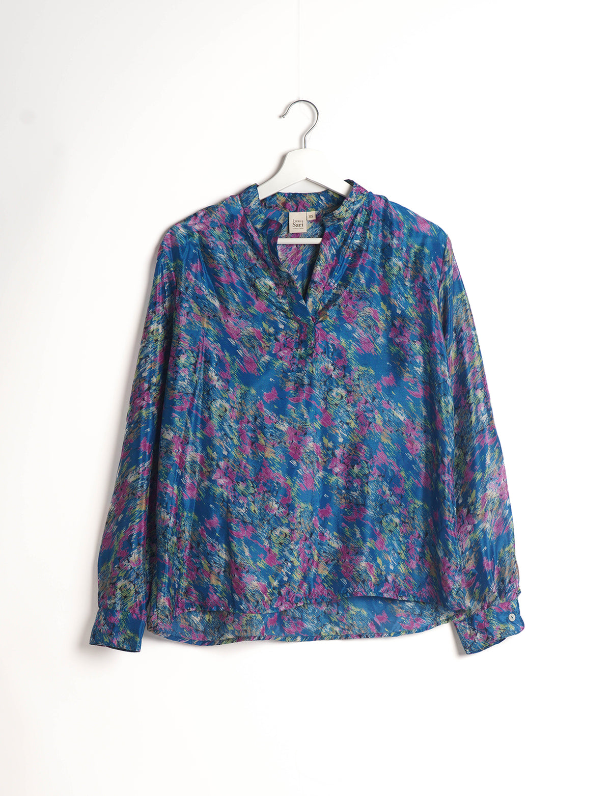 Versatile DAY BLOUSE, a sustainable wardrobe essential with a classic Johnny collar and full sleeves. Lightweight fabric for a comfortable fit, perfect for dressing up or down. Explore ethical clothing and green fashion with this eco-friendly and timeless piece, perfect for any occasion.
