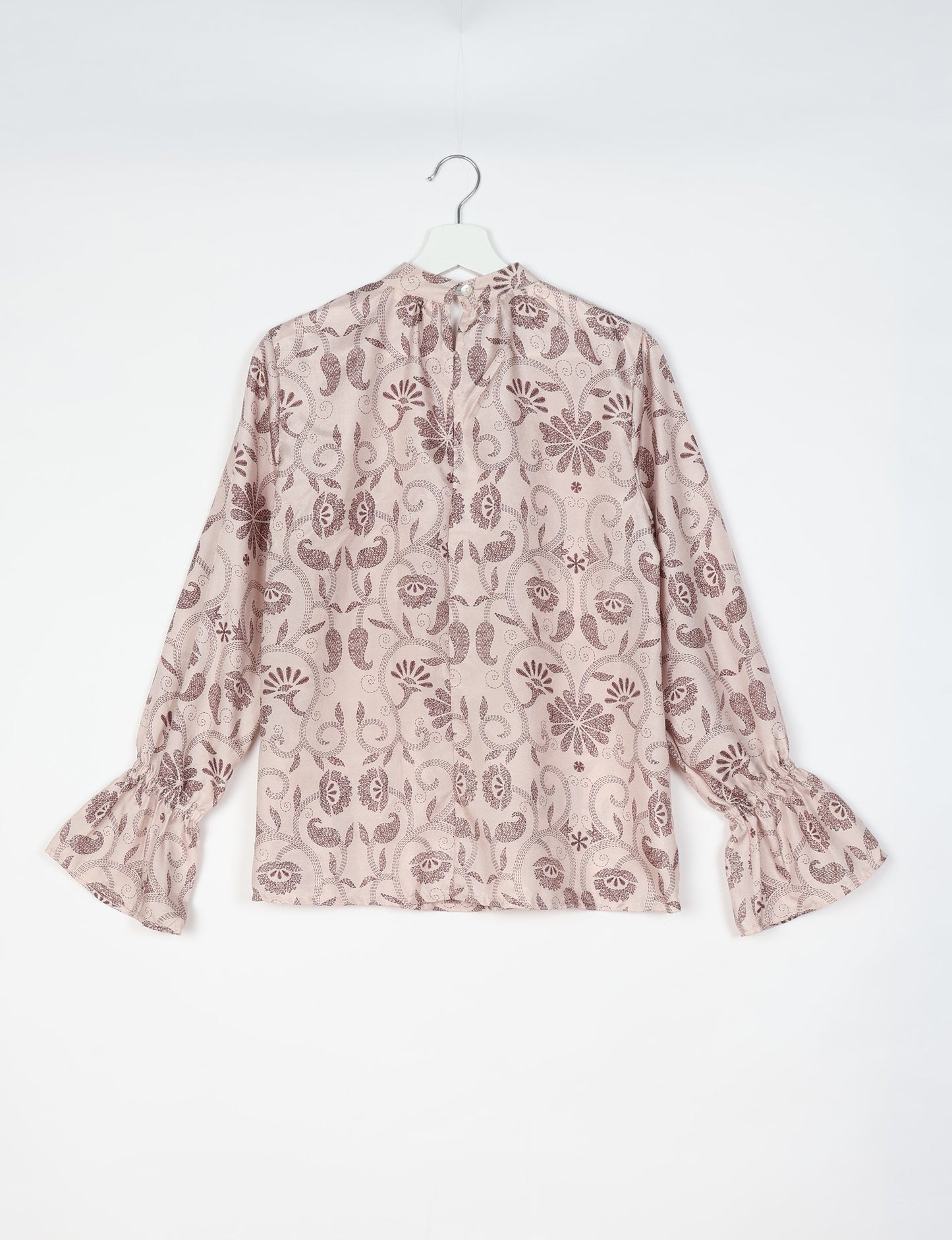 Flowing blouse with peasant sleeves and gathered neckline made from upcycled garments and repurposed clothing, showcasing eco clothing and fair trade fashion in a stylish, comfortable design.