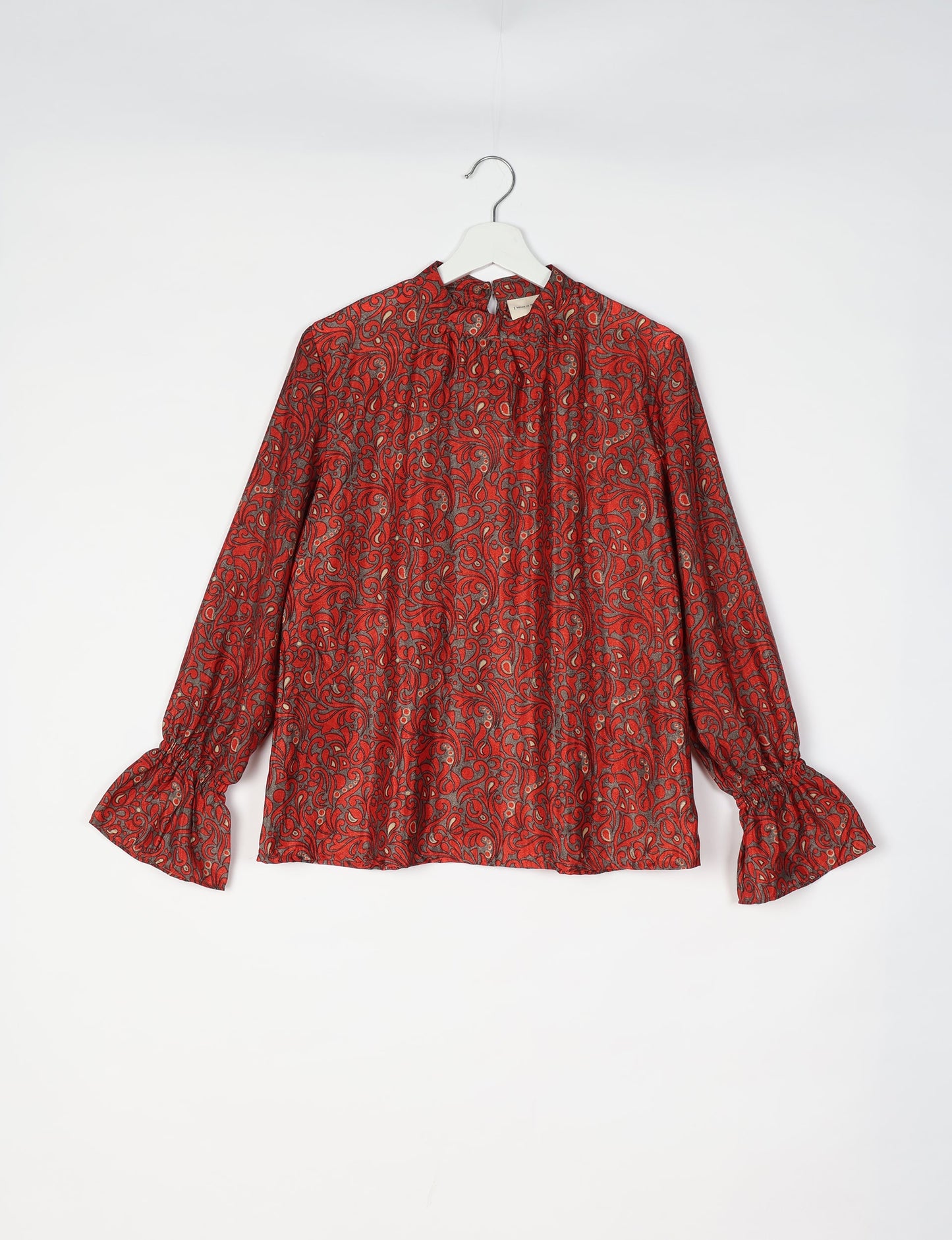 Flowing blouse with peasant sleeves and gathered neckline made from upcycled garments and repurposed clothing, showcasing eco clothing and fair trade fashion in a stylish, comfortable design.