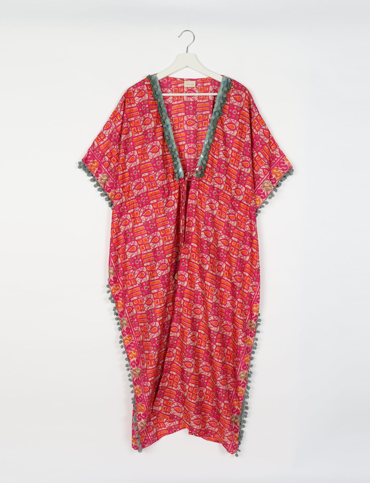 Breezy Kaftan with intricate contrasting lace and embroidery neckline, highlighting the essence of recycled sustainable fashion, slow fashion, and repurposed clothing. A perfect example of eco clothing and conscious clothing, made from recycled materials, promoting carbon neutral fashion and ethical fashion. Ideal for those seeking upcycled garments and natural clothing, as part of the sustainable apparel movement.