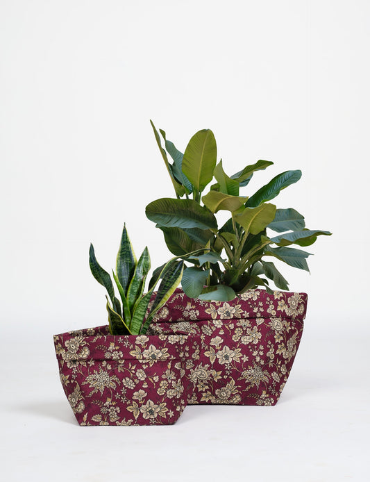 Upgrade your plant aesthetics sustainably with our PLANT POT COVER SET – two handmade covers crafted from preloved saris. Ethical and green, these covers bring eco-friendly charm to your plants and your space.