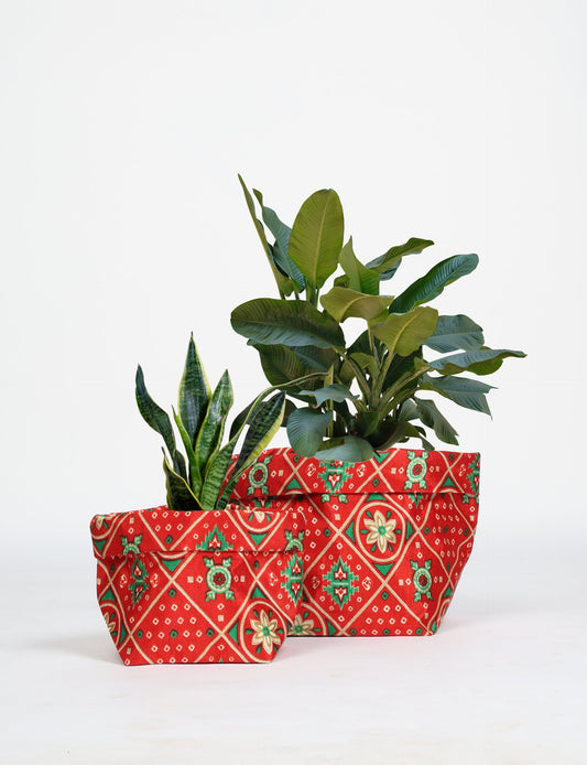 Upgrade your plant aesthetics sustainably with our PLANT POT COVER SET – two handmade covers crafted from preloved saris. Ethical and green, these covers bring eco-friendly charm to your plants and your space.