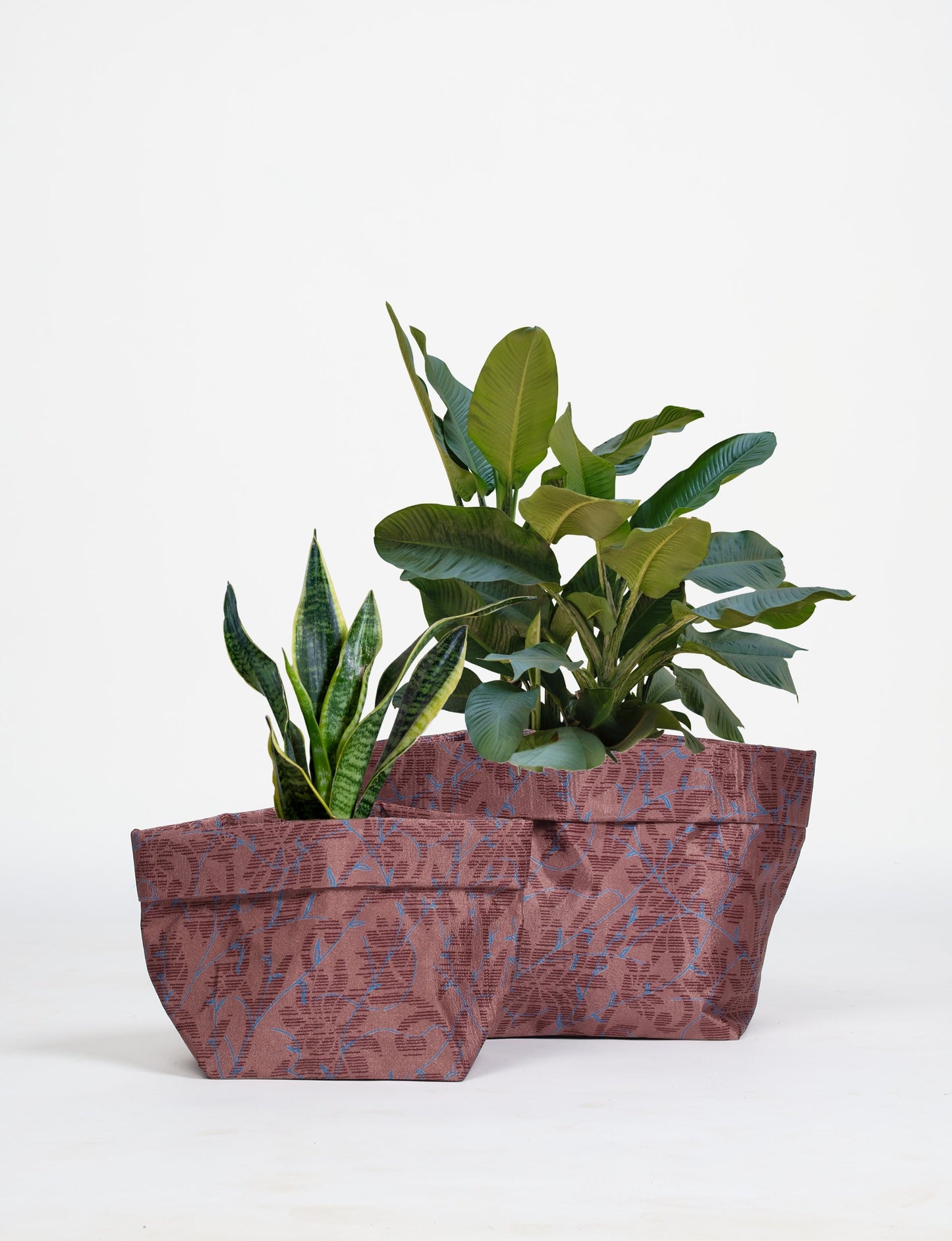 Upgrade your plant aesthetics sustainably with our PLANT POT COVER SET – two handmade covers crafted from preloved saris. Ethical and green, these covers bring eco-friendly charm to your plants and your space.