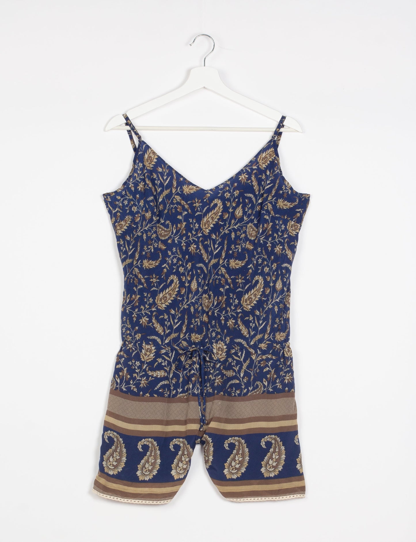 Vibrant playsuit with lace accents, crafted from upcycled saris. Embrace ethical fashion with this unique piece designed for conscious consumers.