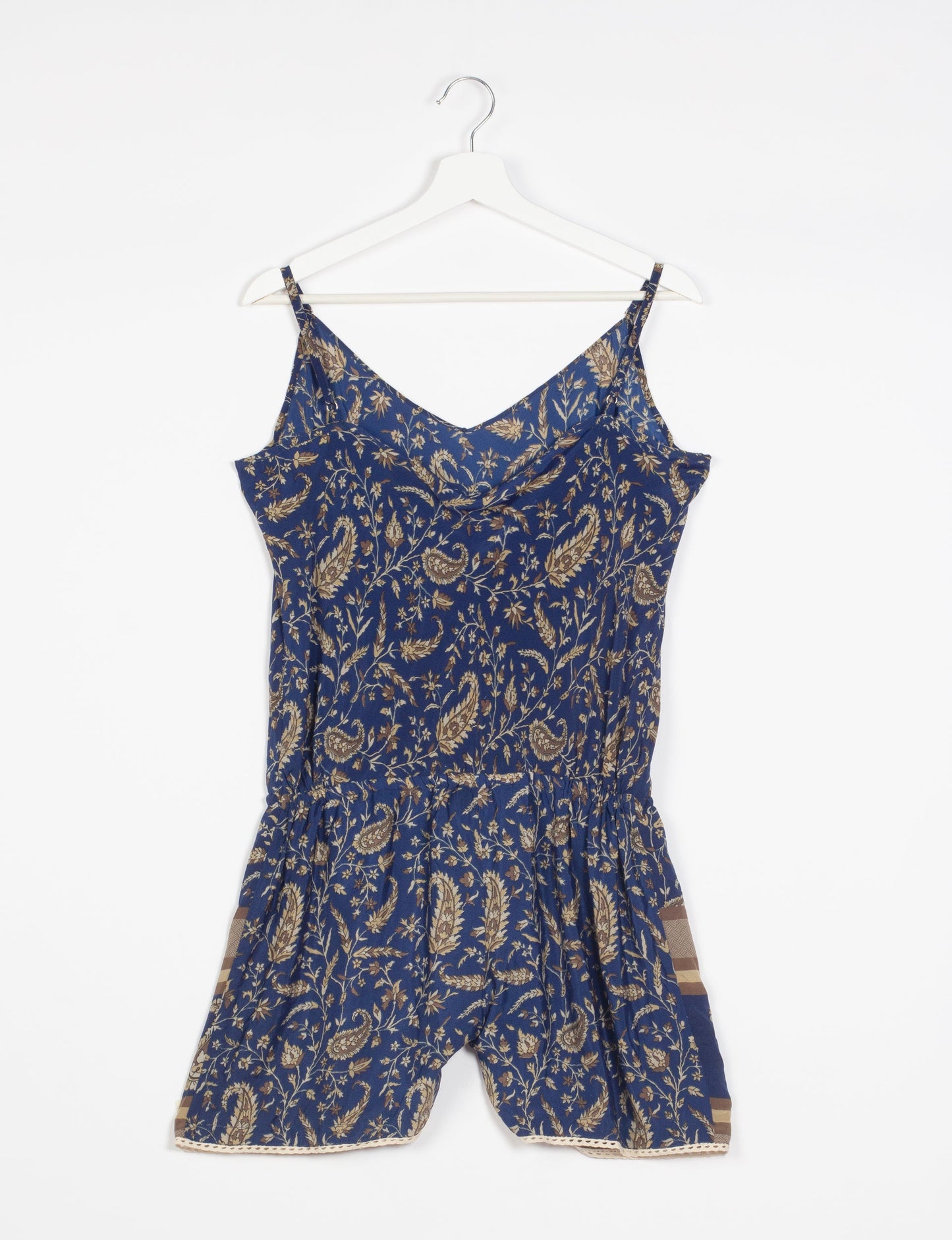 Vibrant playsuit with lace accents, crafted from upcycled saris. Embrace ethical fashion with this unique piece designed for conscious consumers.