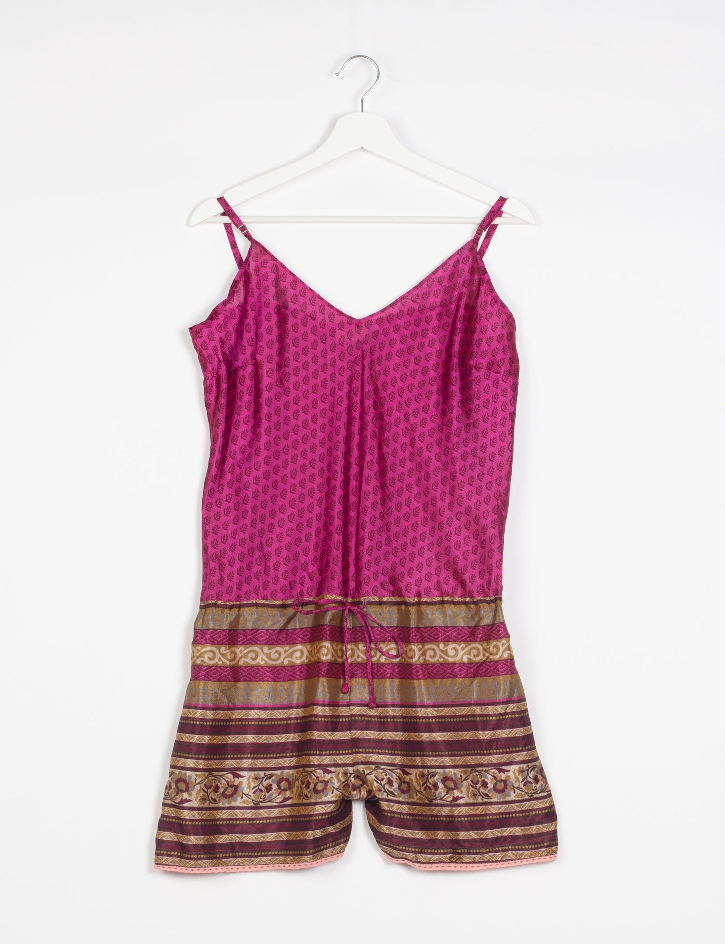 Vibrant playsuit with lace accents, crafted from upcycled saris. Embrace ethical fashion with this unique piece designed for conscious consumers.