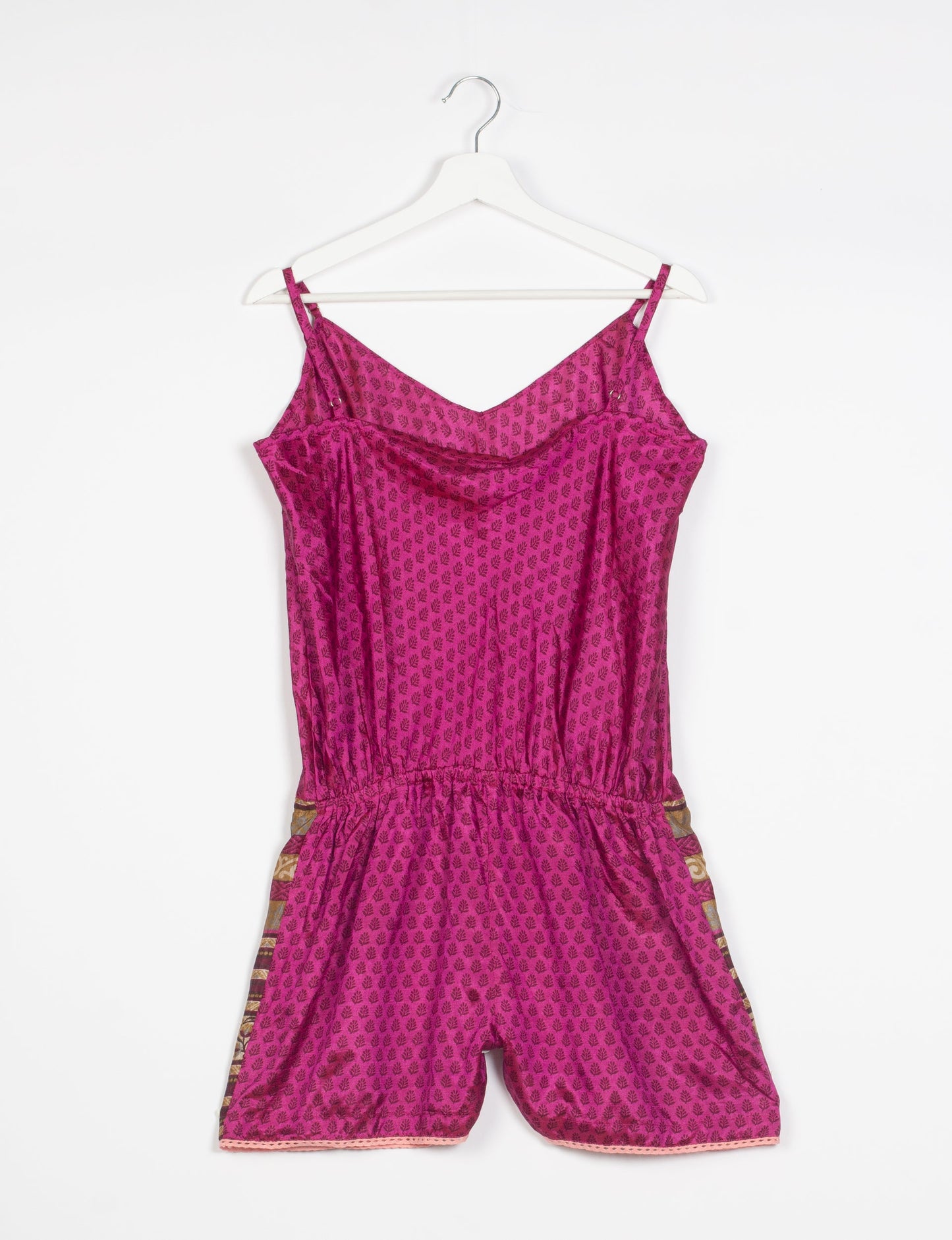 Vibrant playsuit with lace accents, crafted from upcycled saris. Embrace ethical fashion with this unique piece designed for conscious consumers.