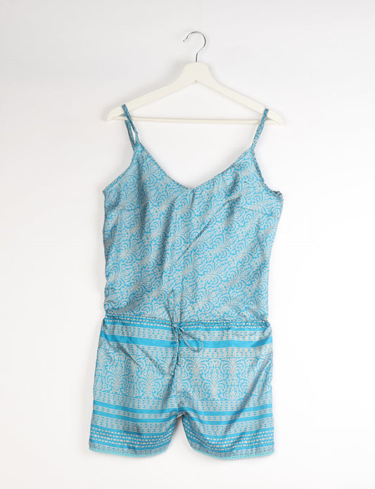 Vibrant playsuit with lace accents, crafted from upcycled saris. Embrace ethical fashion with this unique piece designed for conscious consumers.