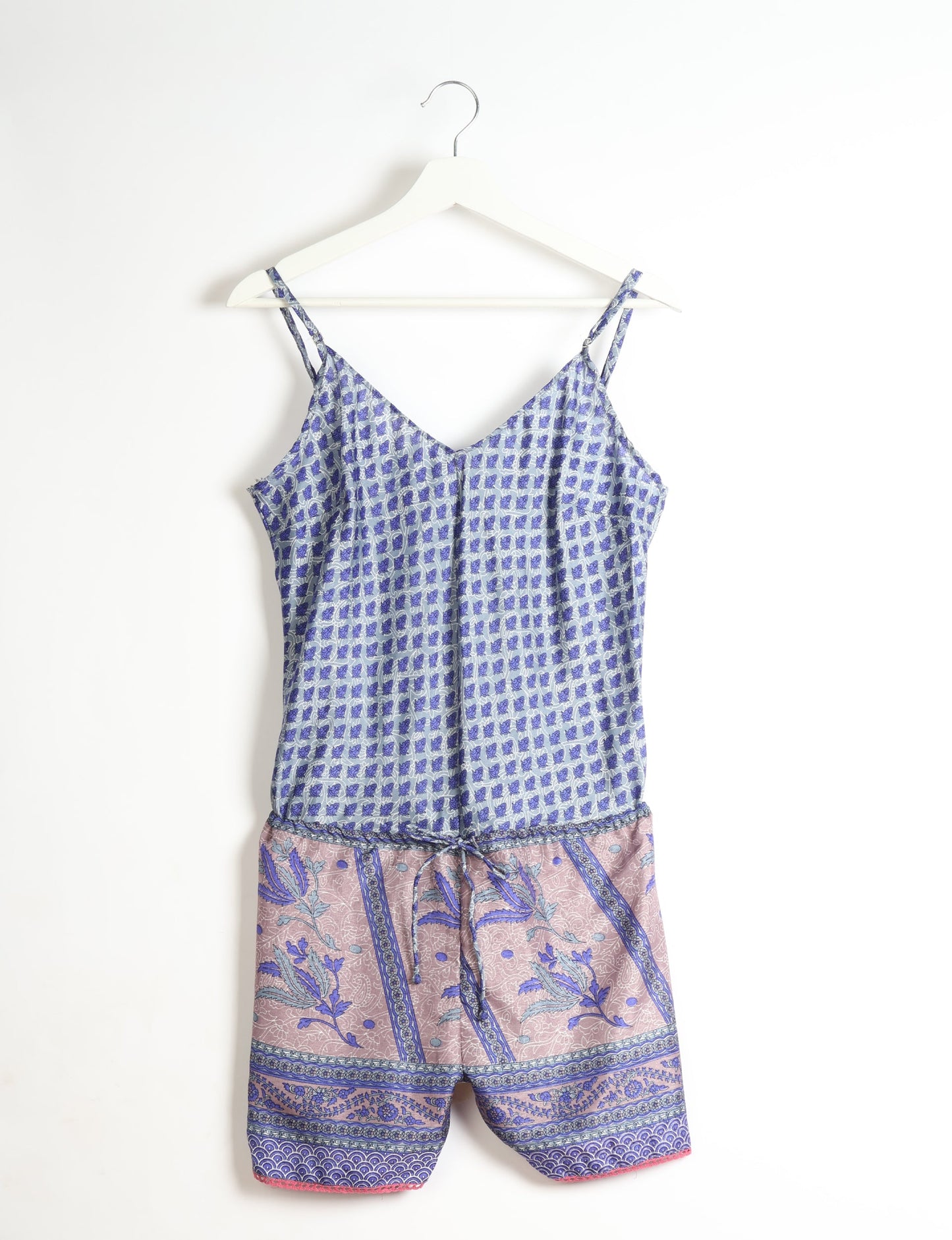 Vibrant playsuit with lace accents, crafted from upcycled saris. Embrace ethical fashion with this unique piece designed for conscious consumers.