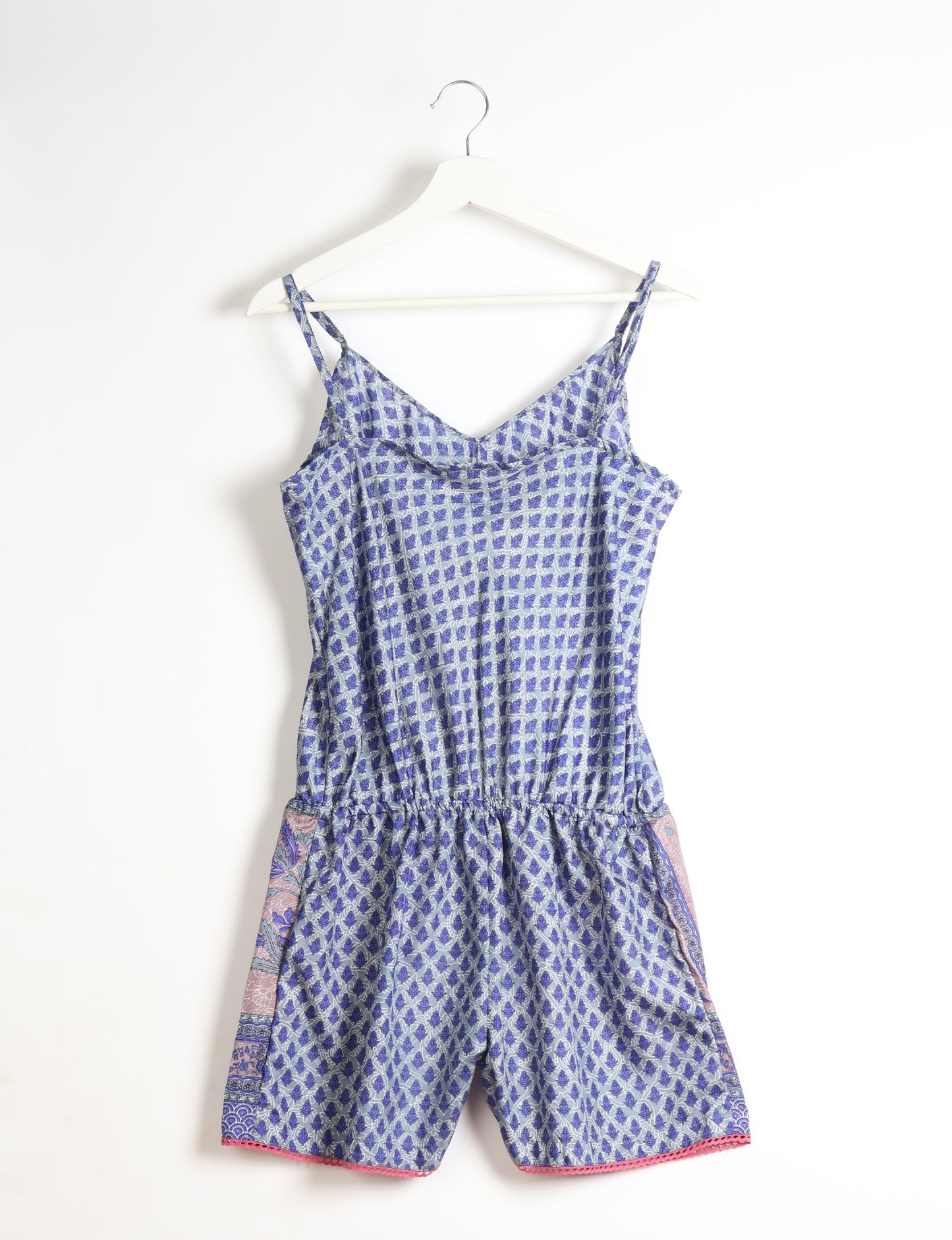 Vibrant playsuit with lace accents, crafted from upcycled saris. Embrace ethical fashion with this unique piece designed for conscious consumers.