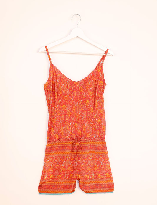 Vibrant playsuit with lace accents, crafted from upcycled saris. Embrace ethical fashion with this unique piece designed for conscious consumers.