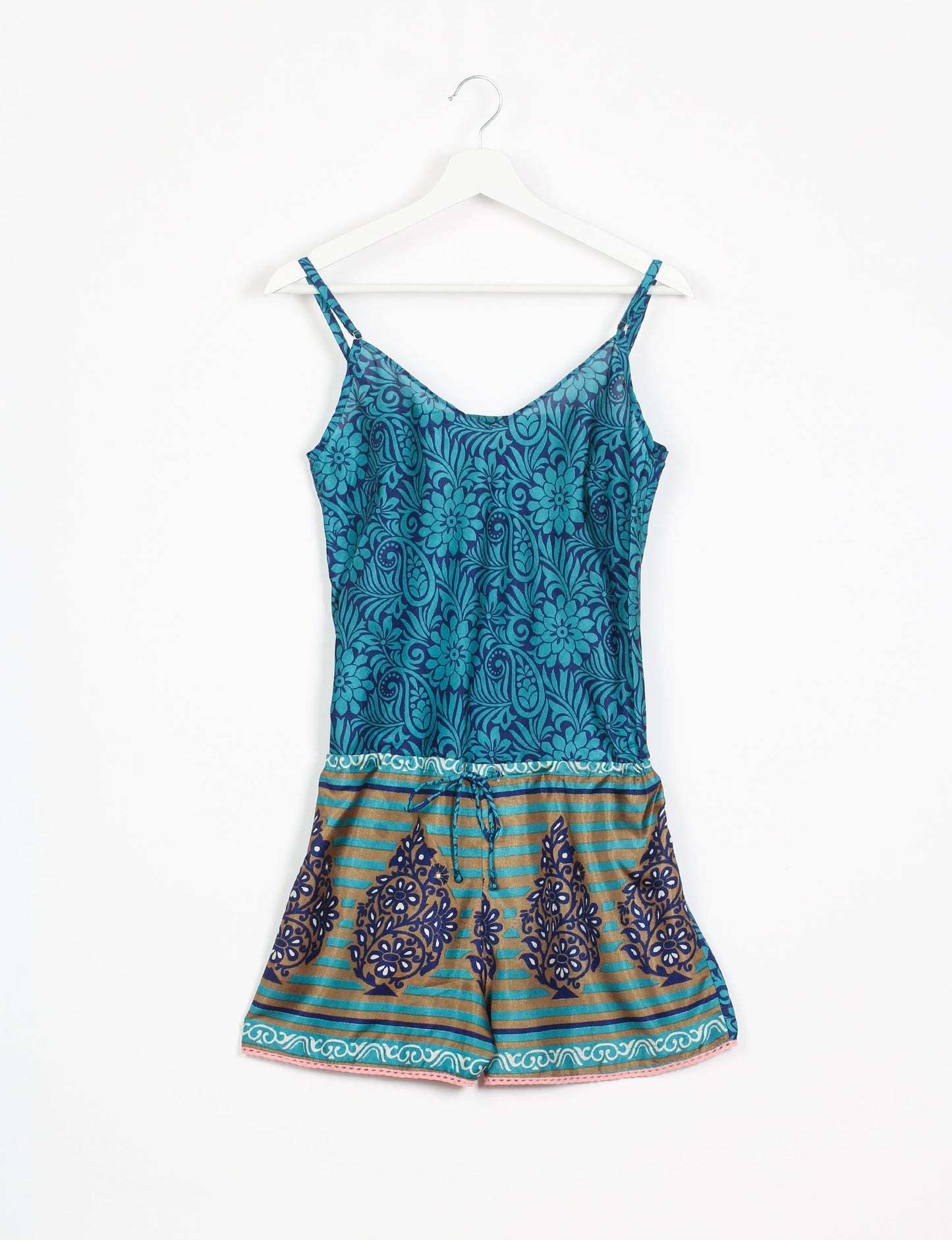 Vibrant playsuit with lace accents, crafted from upcycled saris. Embrace ethical fashion with this unique piece designed for conscious consumers.