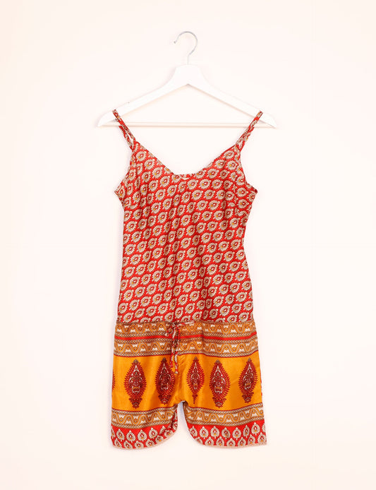 Vibrant playsuit with lace accents, crafted from upcycled saris. Embrace ethical fashion with this unique piece designed for conscious consumers.