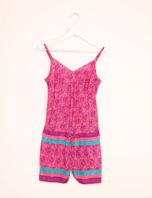 Vibrant playsuit with lace accents, crafted from upcycled saris. Embrace ethical fashion with this unique piece designed for conscious consumers.