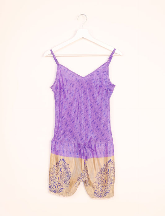 Vibrant playsuit with lace accents, crafted from upcycled saris. Embrace ethical fashion with this unique piece designed for conscious consumers.