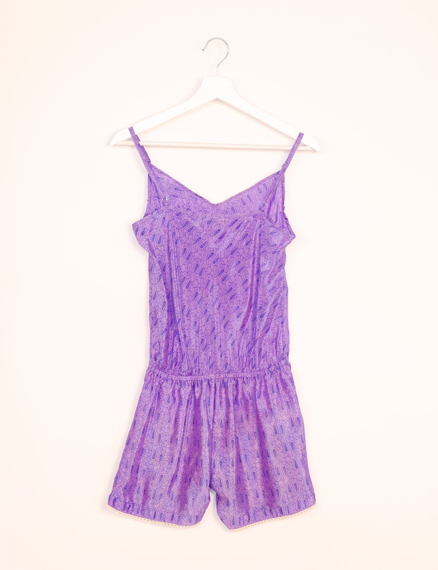 Vibrant playsuit with lace accents, crafted from upcycled saris. Embrace ethical fashion with this unique piece designed for conscious consumers.