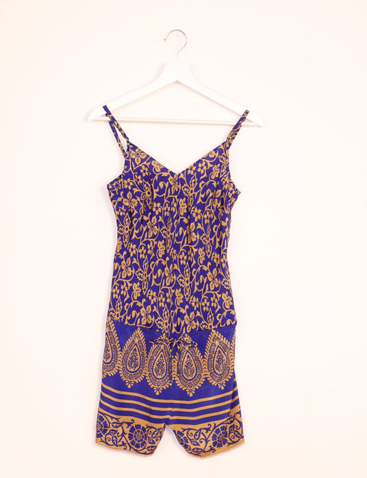 Vibrant playsuit with lace accents, crafted from upcycled saris. Embrace ethical fashion with this unique piece designed for conscious consumers.