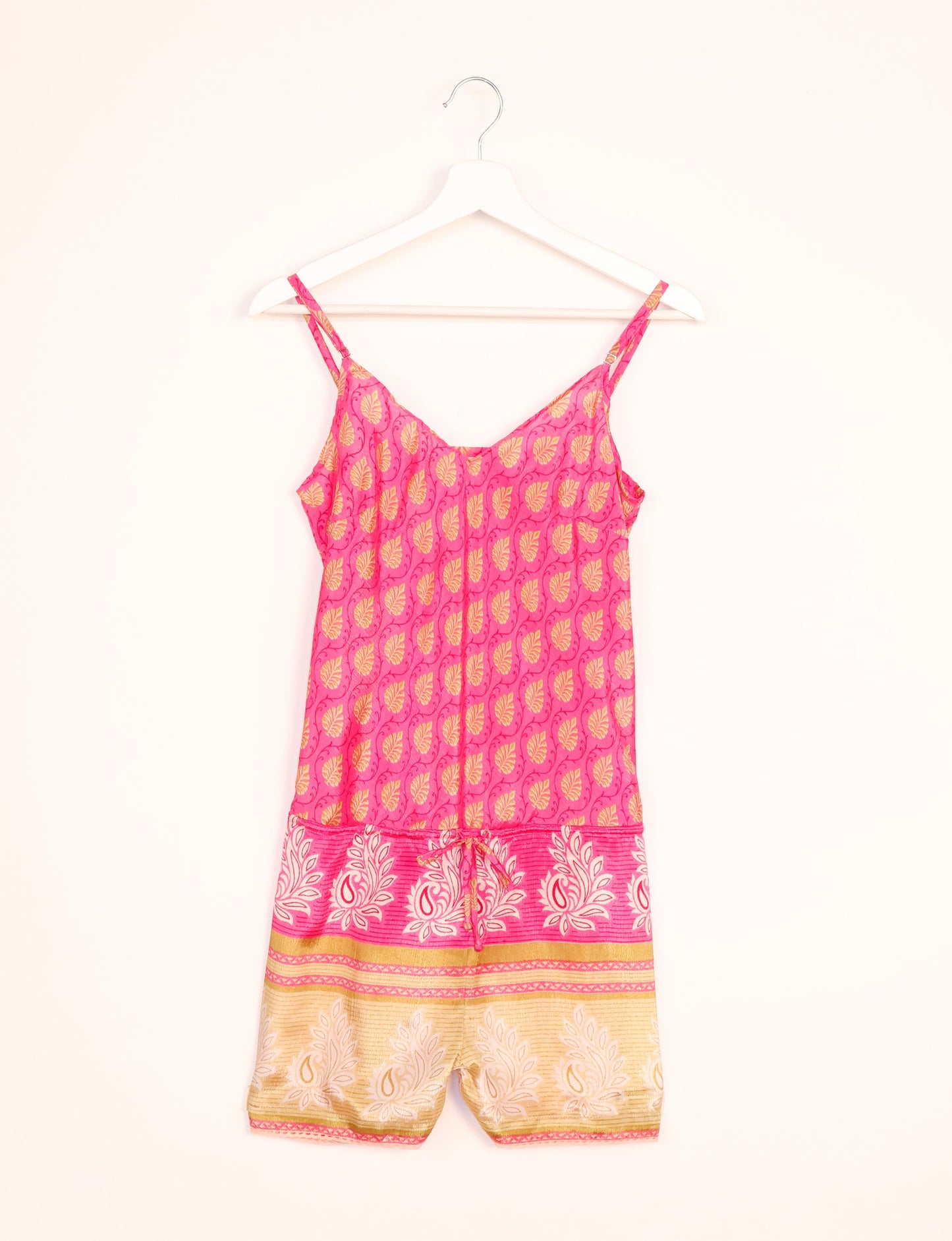 Vibrant playsuit with lace accents, crafted from upcycled saris. Embrace ethical fashion with this unique piece designed for conscious consumers.