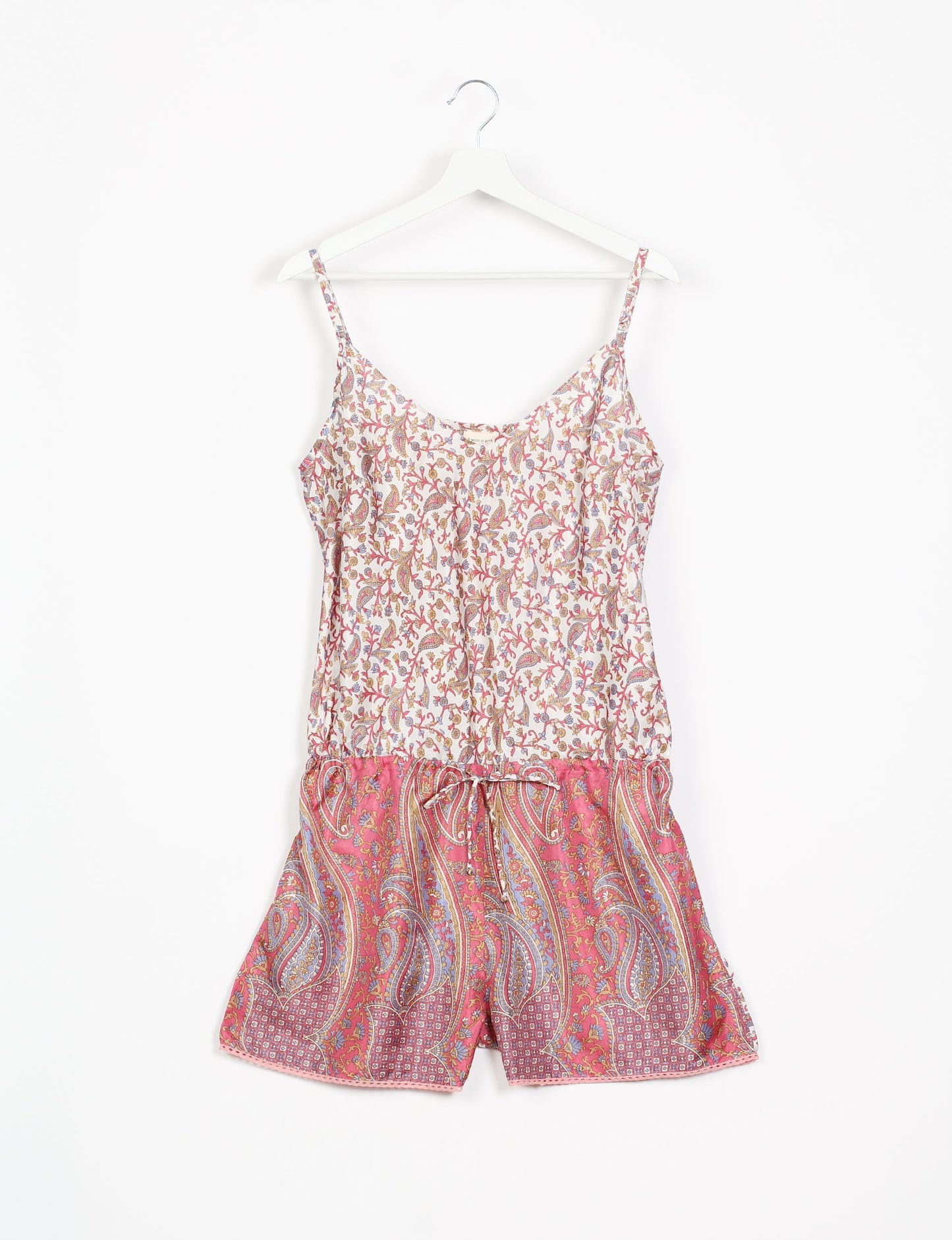 Vibrant playsuit with lace accents, crafted from upcycled saris. Embrace ethical fashion with this unique piece designed for conscious consumers.