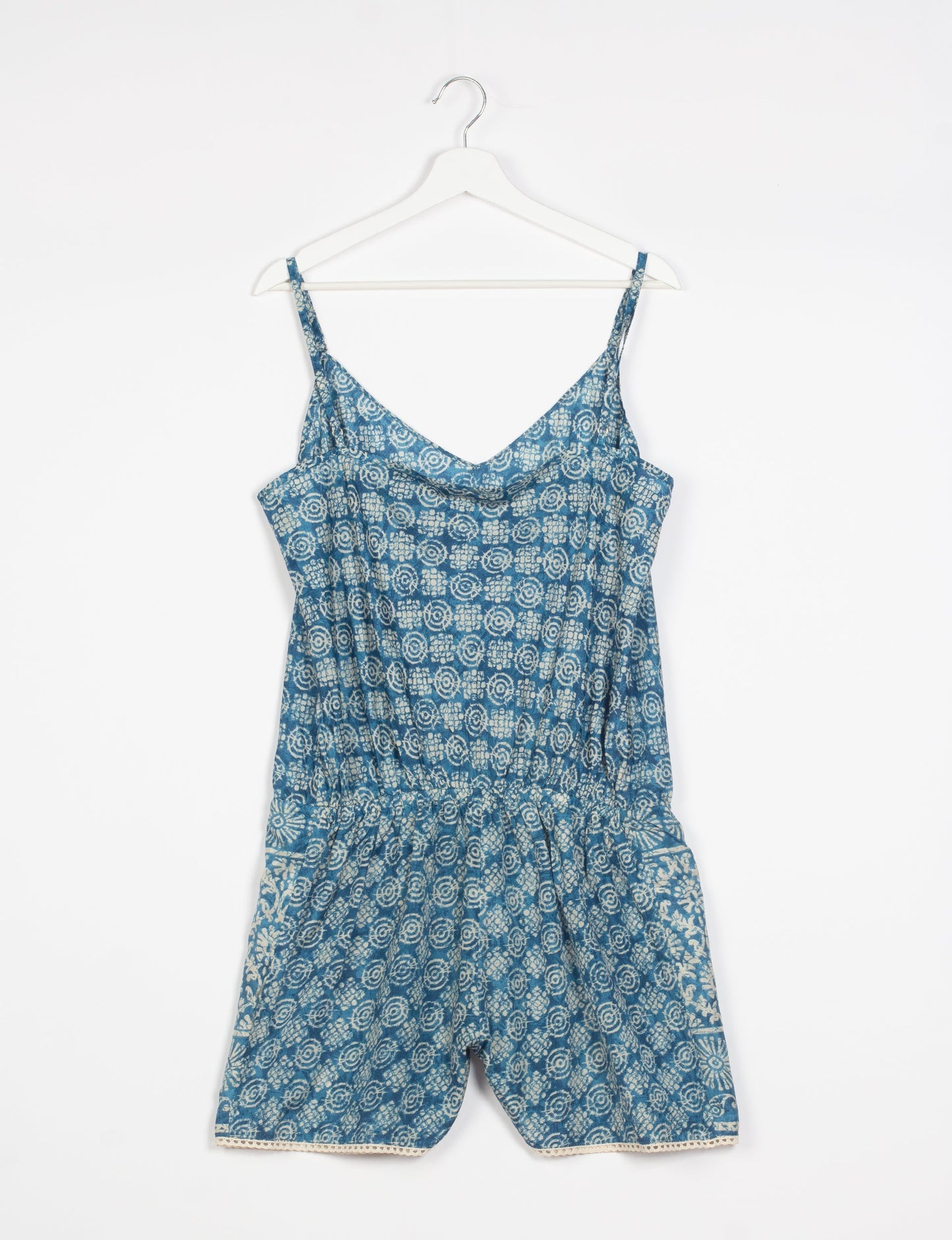 Vibrant playsuit with lace accents, crafted from upcycled saris. Embrace ethical fashion with this unique piece designed for conscious consumers.