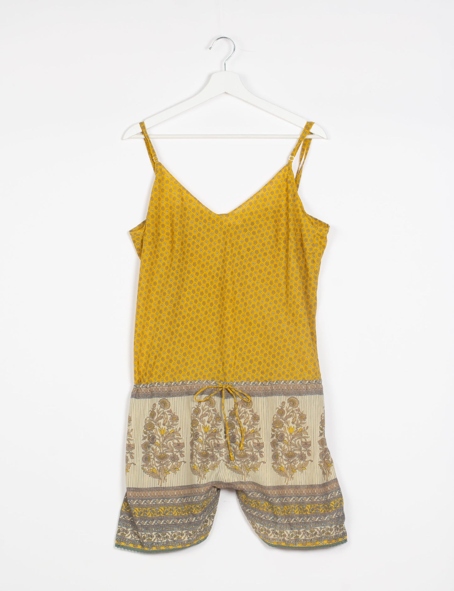 Vibrant playsuit with lace accents, crafted from upcycled saris. Embrace ethical fashion with this unique piece designed for conscious consumers.