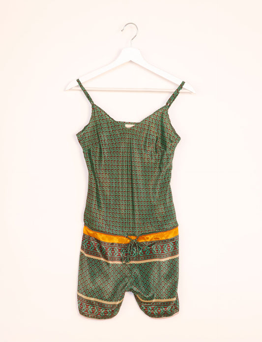 Vibrant playsuit with lace accents, crafted from upcycled saris. Embrace ethical fashion with this unique piece designed for conscious consumers.