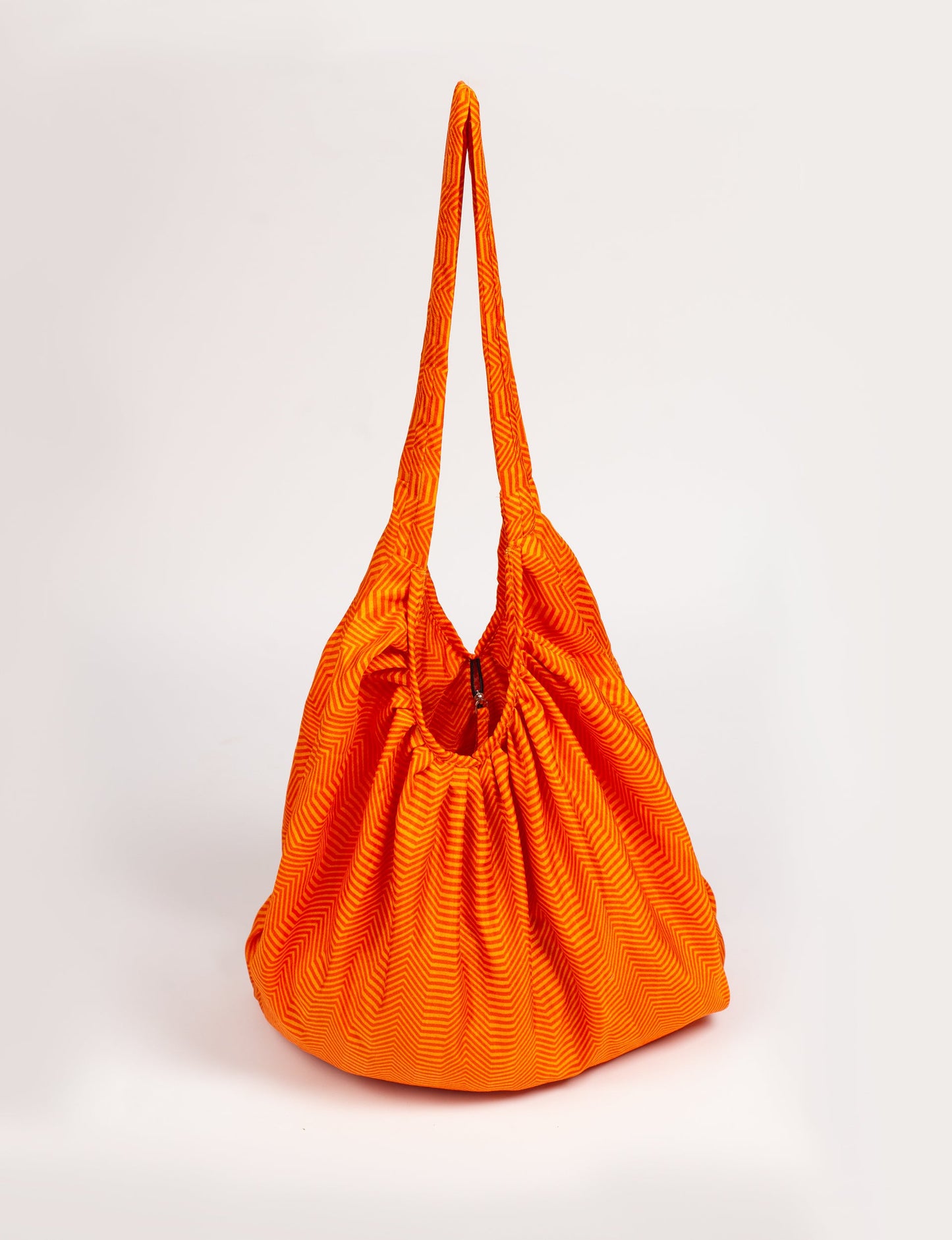 A stylish HOBO BAG made from recycled materials, perfect for eco-conscious fashionistas.