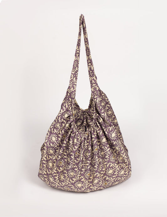 A stylish HOBO BAG made from recycled materials, perfect for eco-conscious fashionistas.