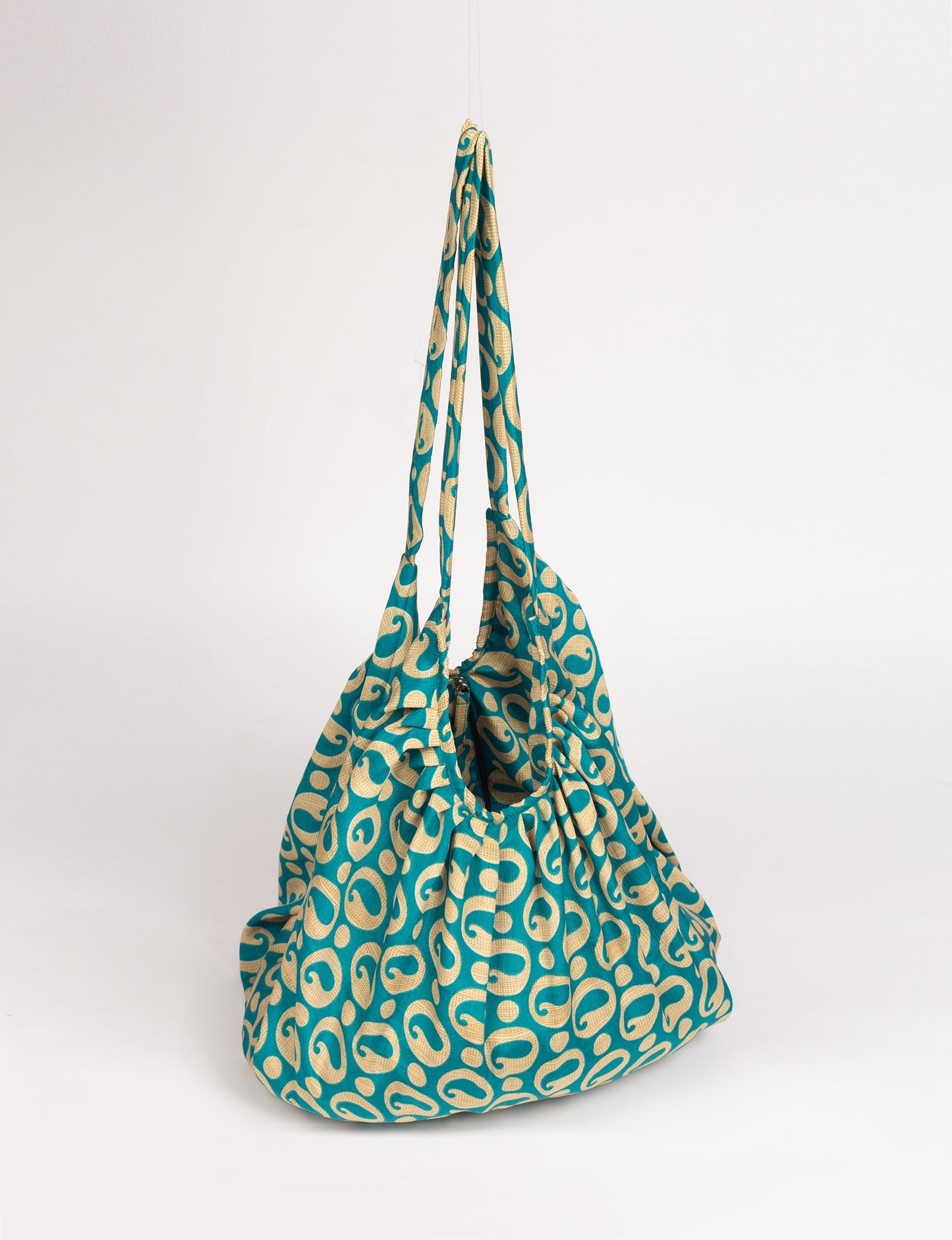 A stylish HOBO BAG made from recycled materials, perfect for eco-conscious fashionistas.