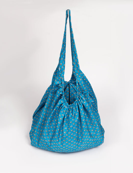 A stylish HOBO BAG made from recycled materials, perfect for eco-conscious fashionistas.