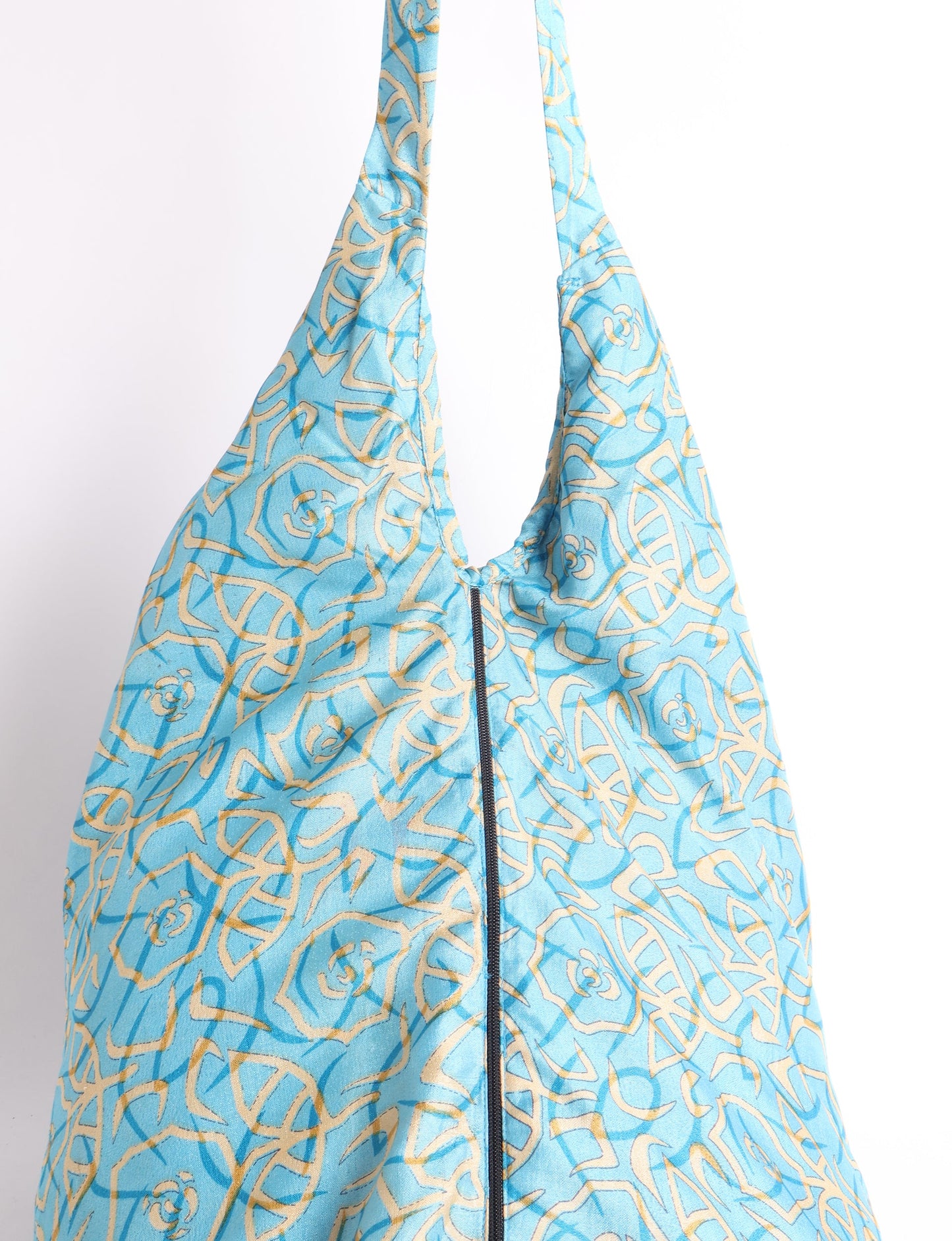 A stylish HOBO BAG made from recycled materials, perfect for eco-conscious fashionistas.