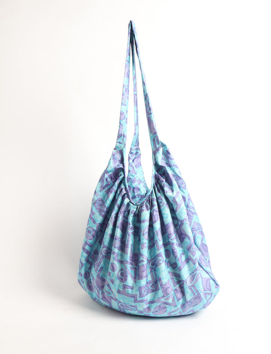 A stylish HOBO BAG made from recycled materials, perfect for eco-conscious fashionistas.