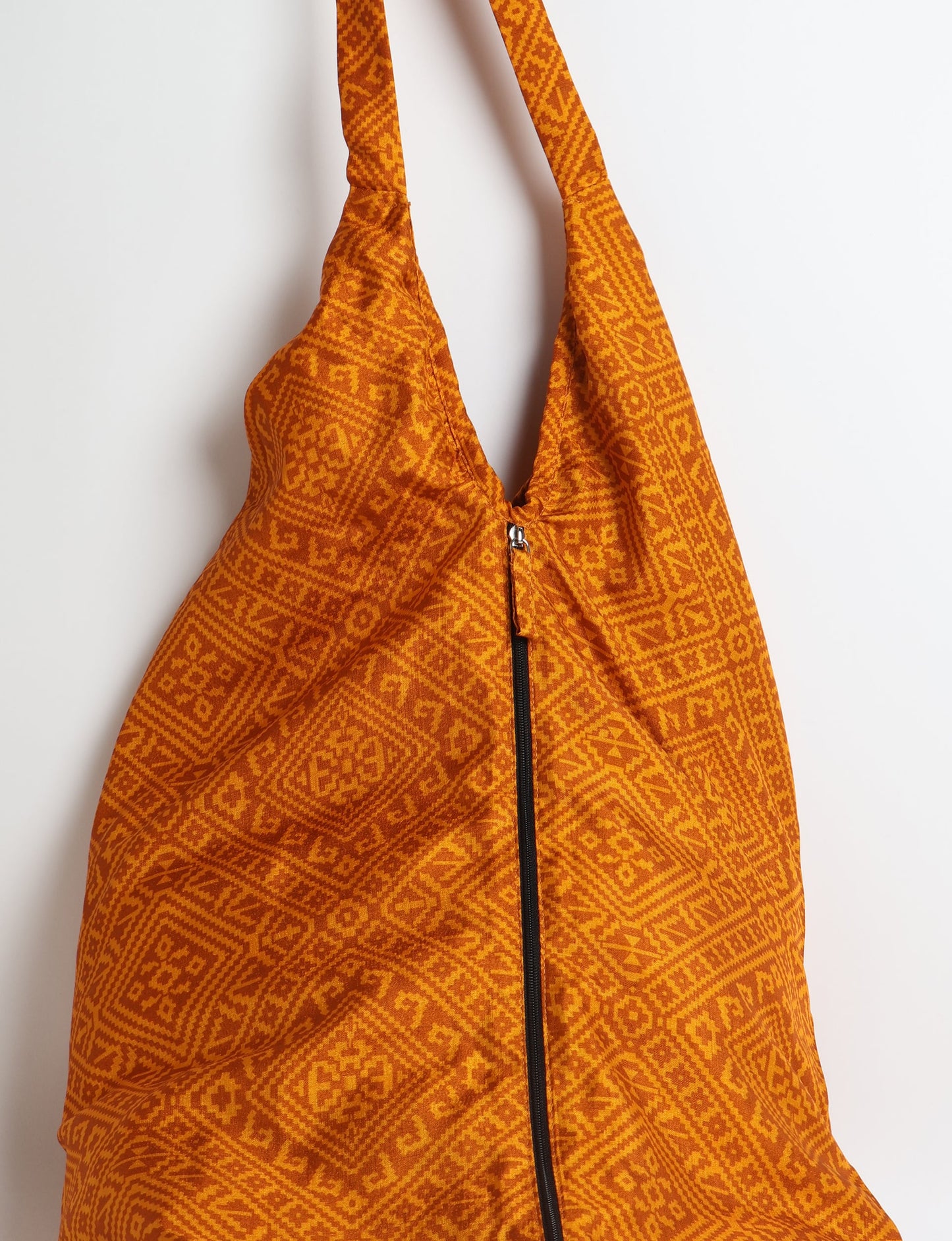 A stylish HOBO BAG made from recycled materials, perfect for eco-conscious fashionistas.
